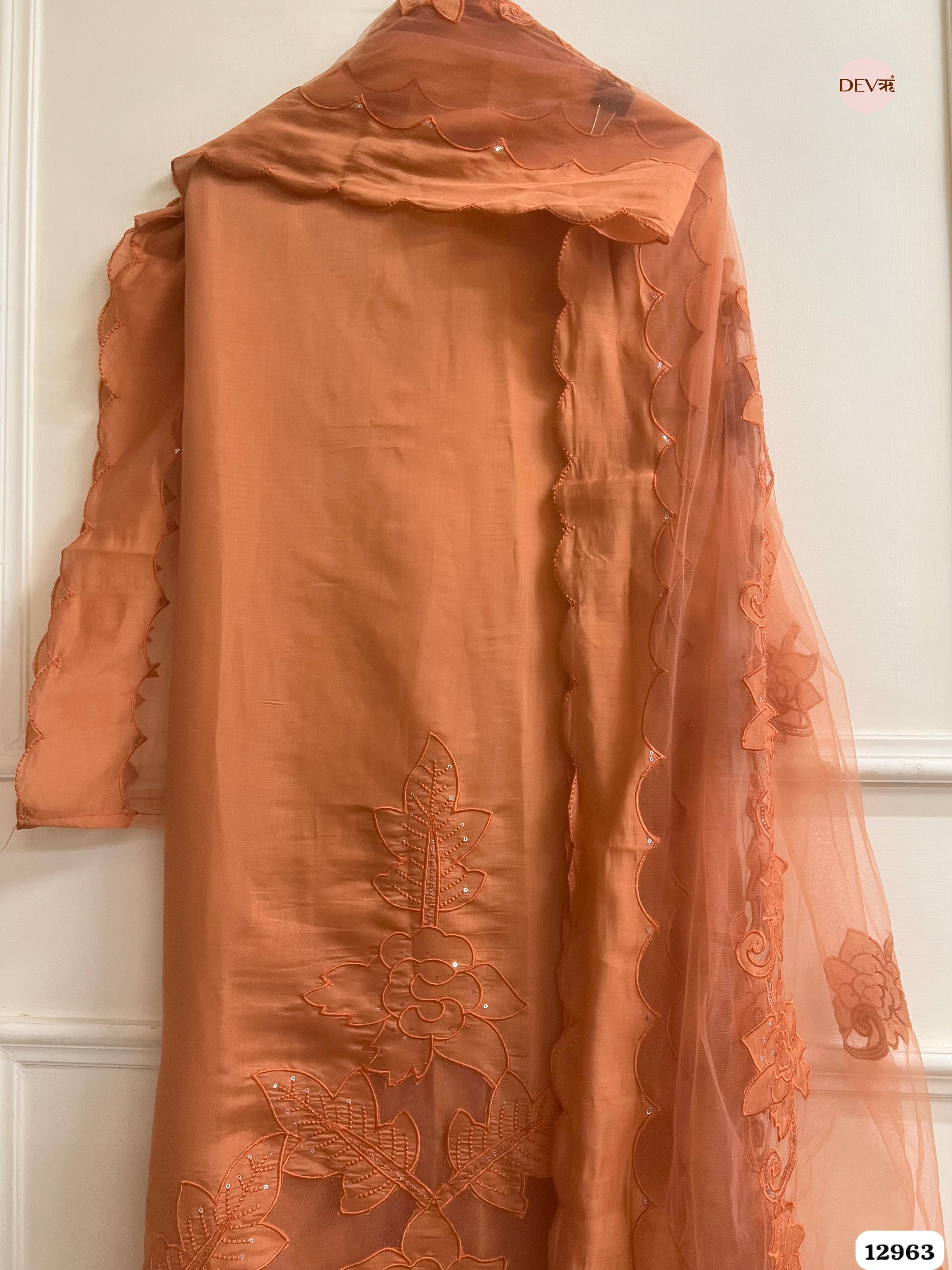 Peach Roman Silk Embroidered Unstitched 3-Piece Suit (Devri – D.No 12963)