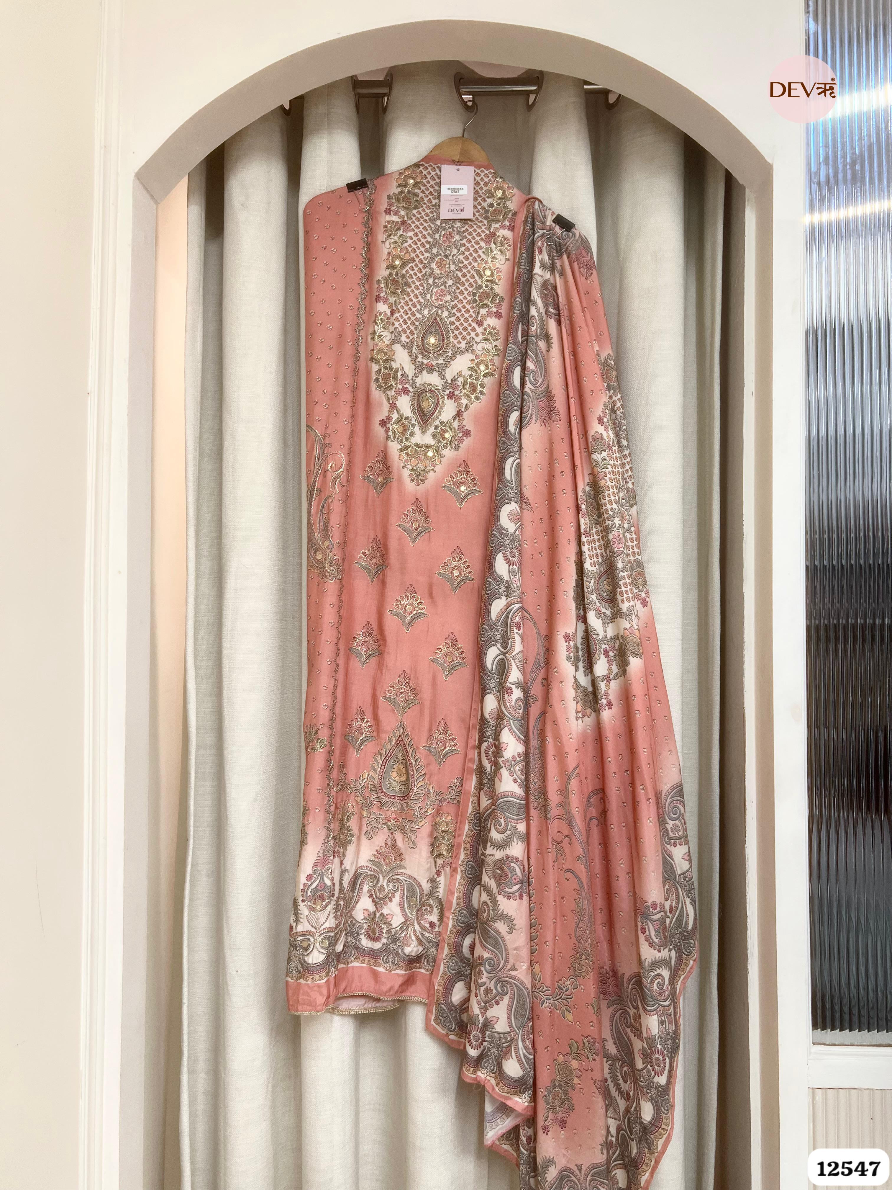 Peach Muslin Embroidered Unstitched 3-Piece Suit (Devri – D.No 12547)