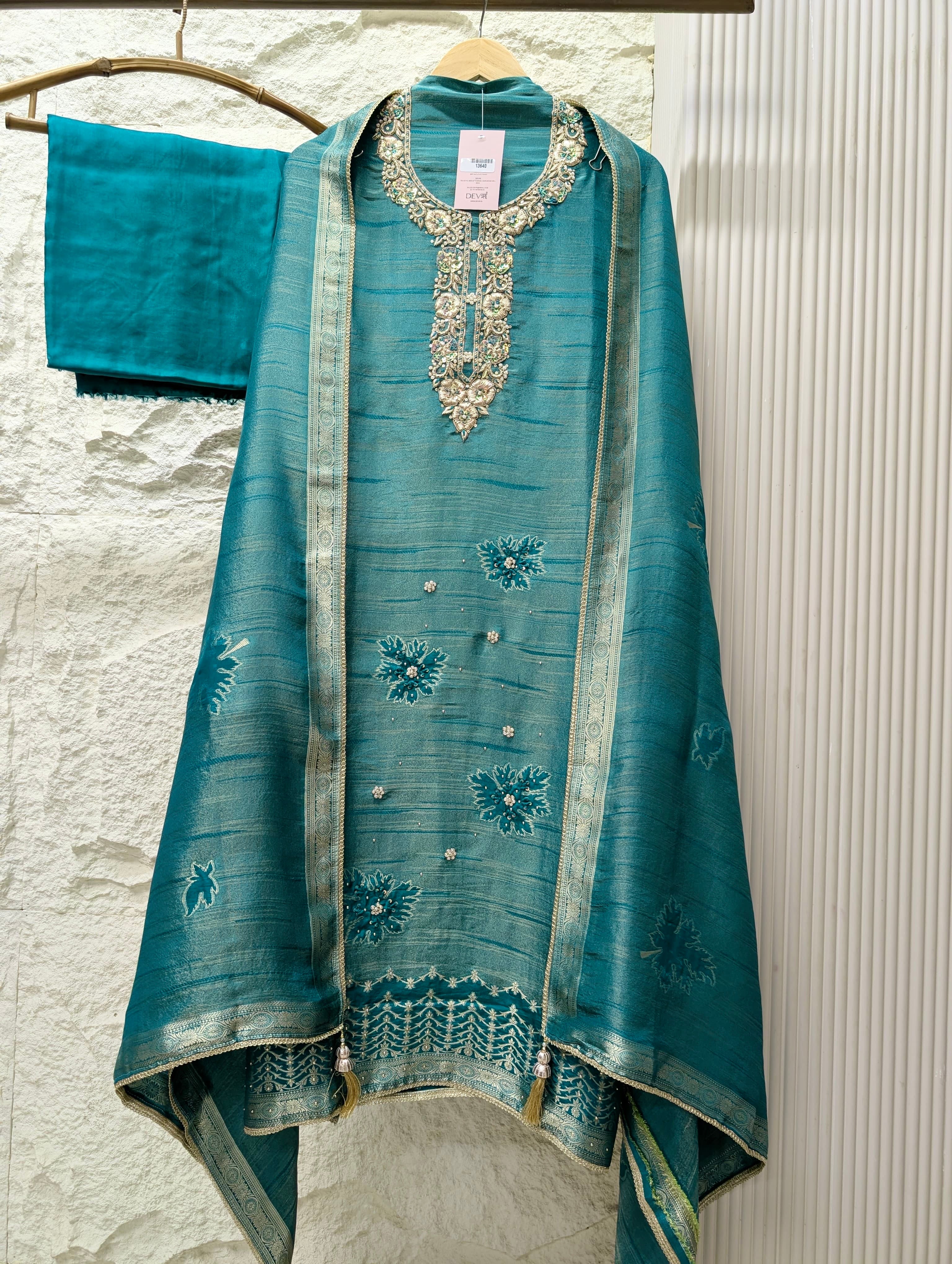 Teal Pure Girafe Banarasi Silk Embroidered Unstitched 3-Piece Suit (Devri – D.No 13640)