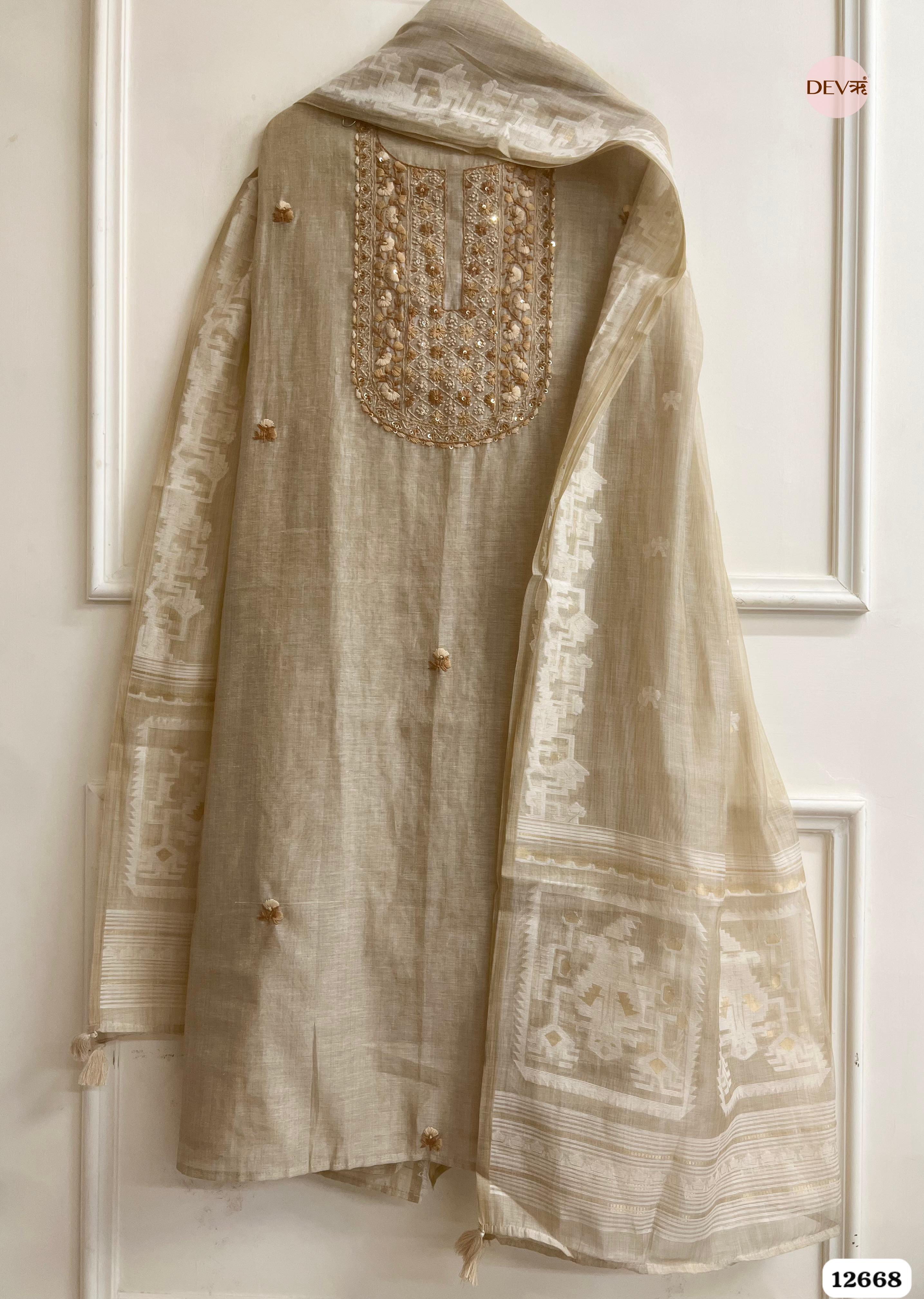 Beige Mul Chanderi Embroidered Unstitched 3-Piece Suit (Devri – D.No 12668)
