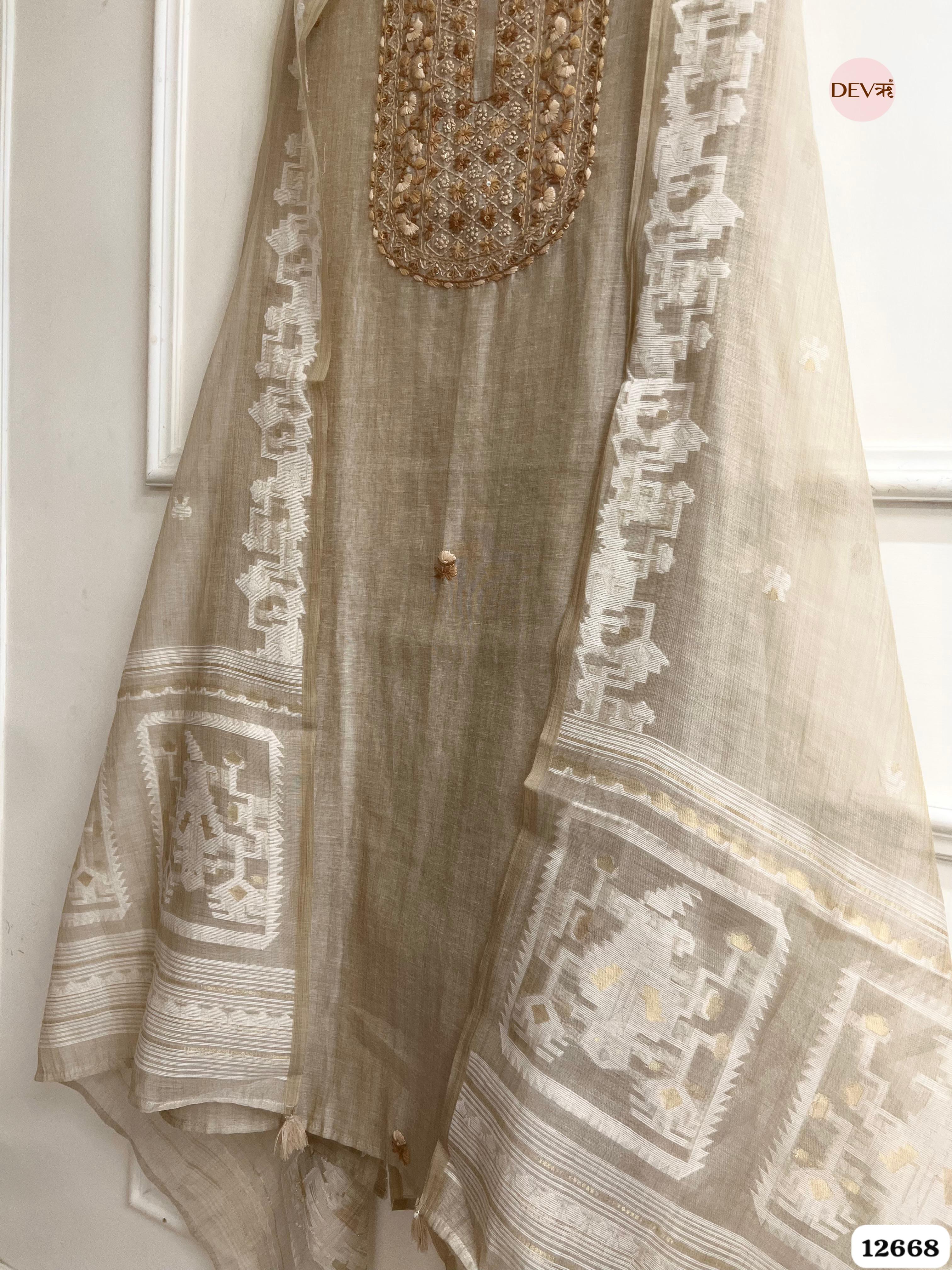 Beige Mul Chanderi Embroidered Unstitched 3-Piece Suit (Devri – D.No 12668)