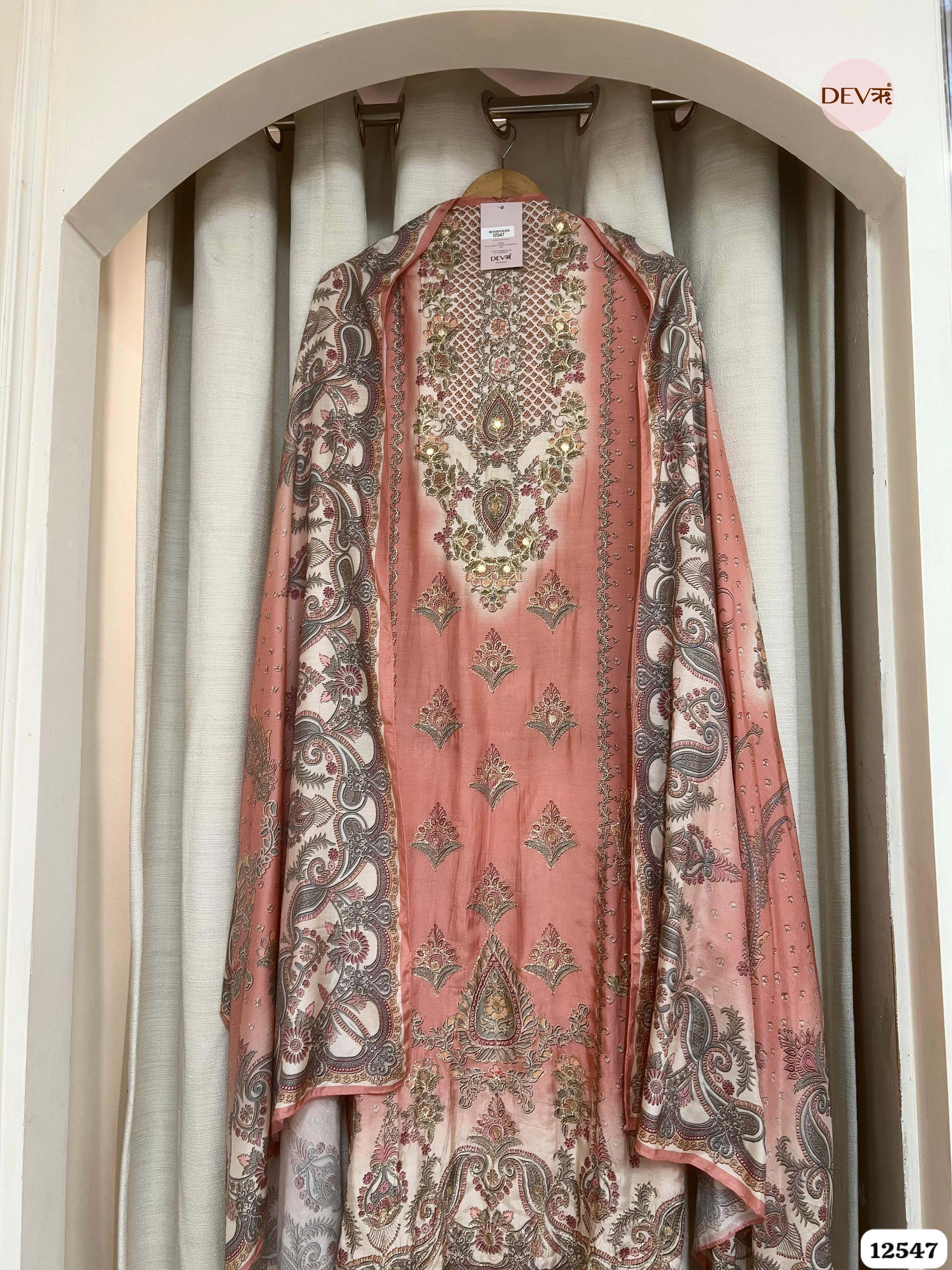 Peach Muslin Embroidered Unstitched 3-Piece Suit (Devri – D.No 12547)