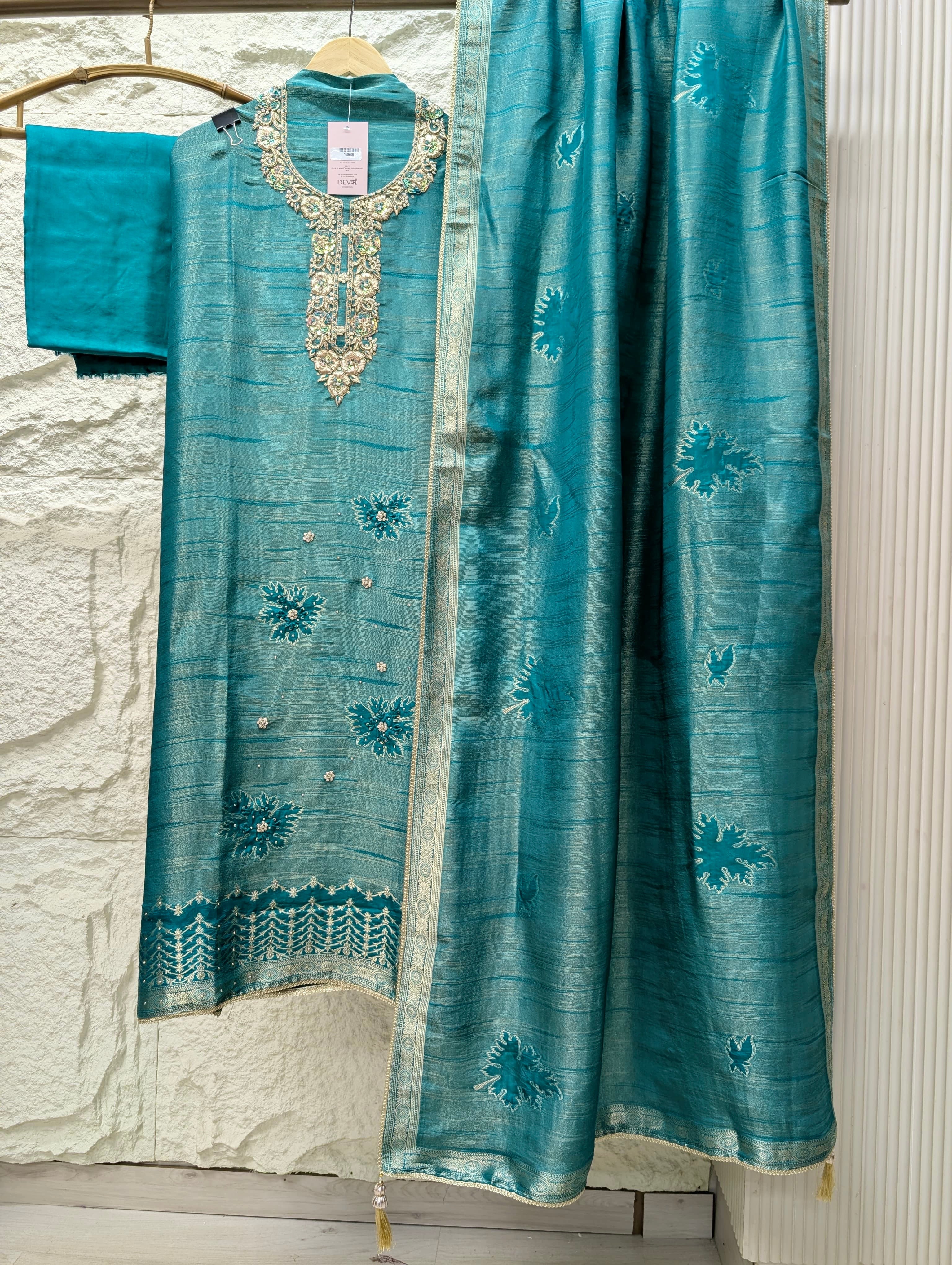 Teal Pure Girafe Banarasi Silk Embroidered Unstitched 3-Piece Suit (Devri – D.No 13640)