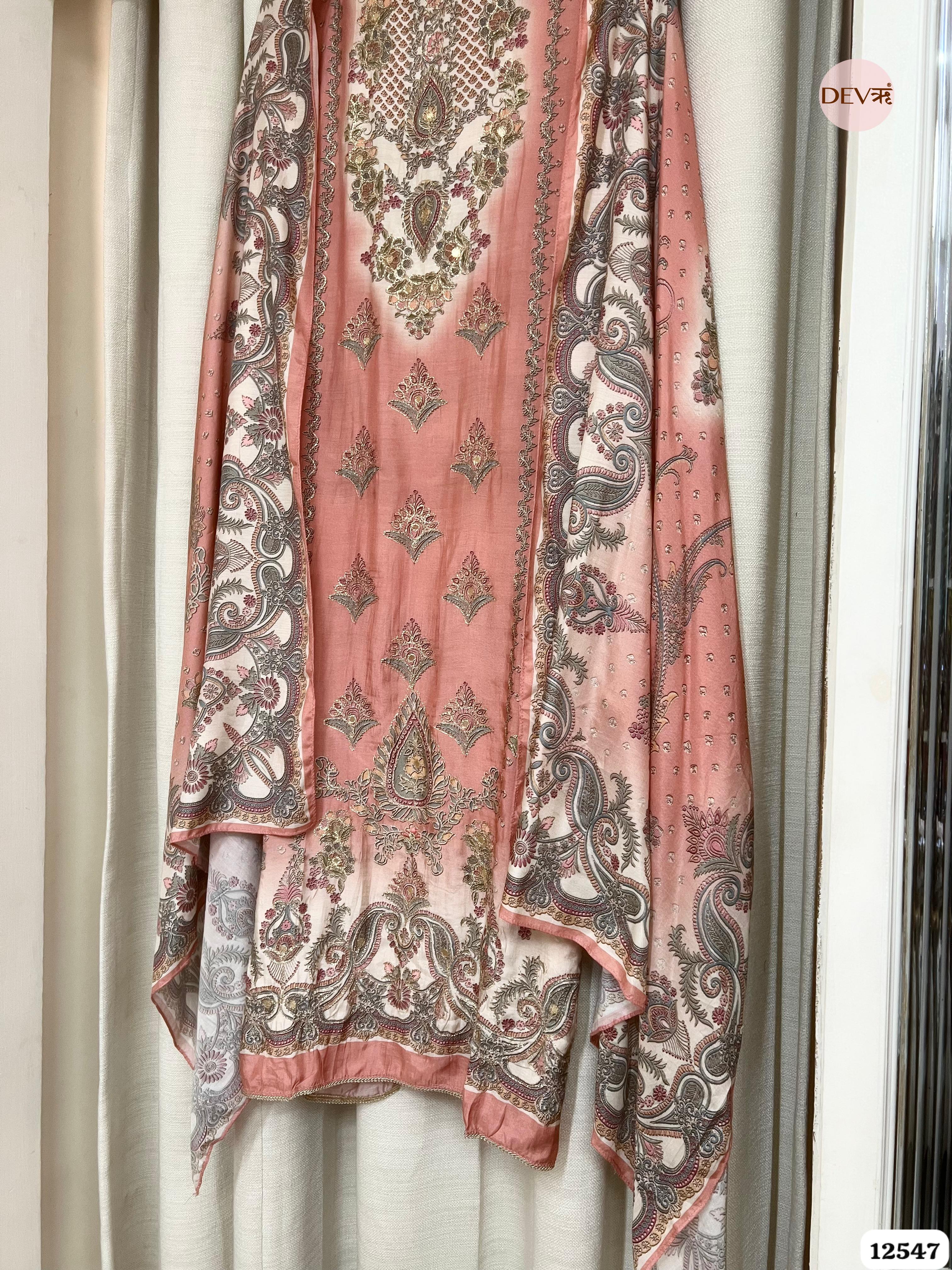 Peach Muslin Embroidered Unstitched 3-Piece Suit (Devri – D.No 12547)
