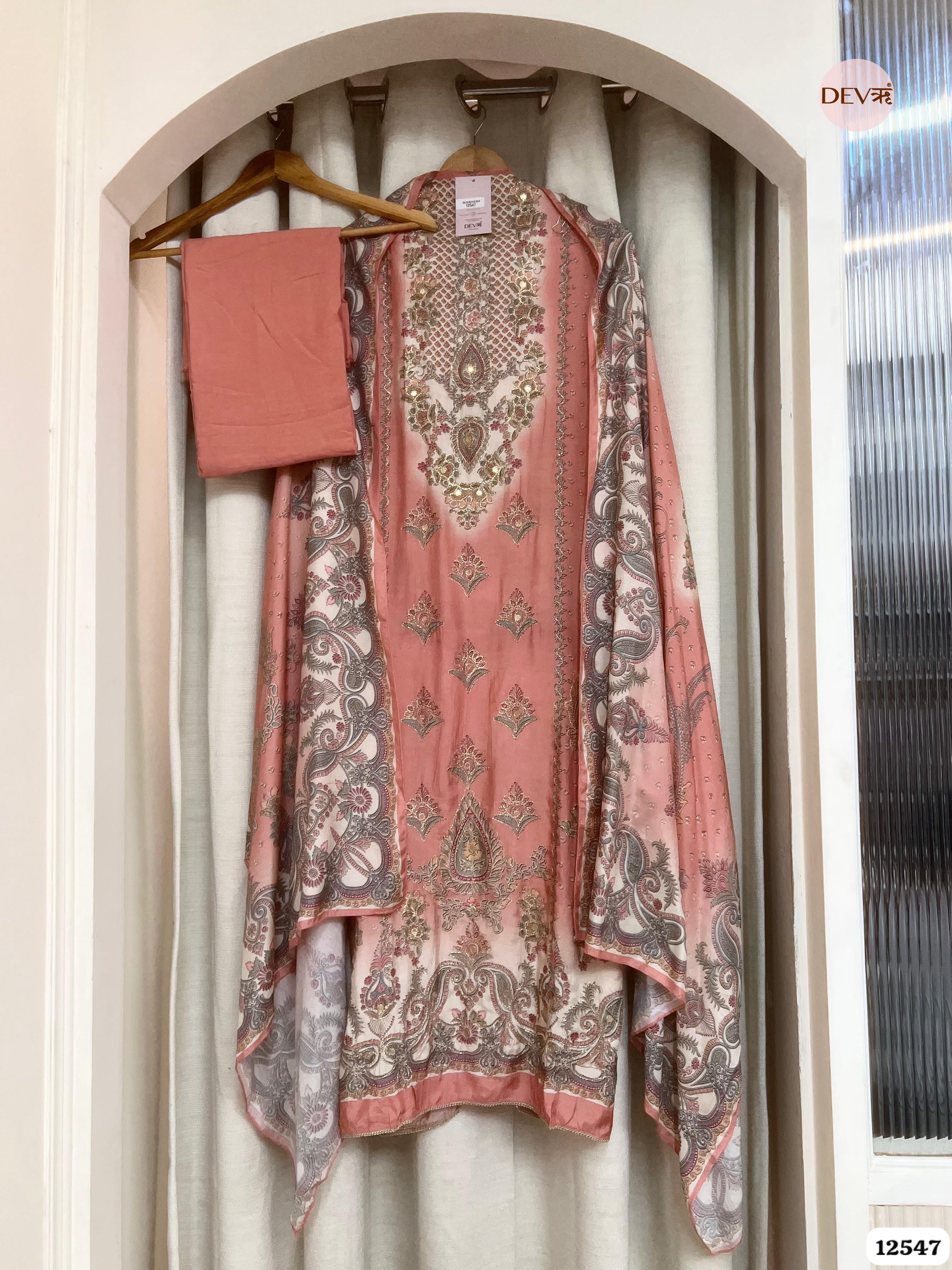 Peach Muslin Embroidered Unstitched 3-Piece Suit (Devri – D.No 12547)