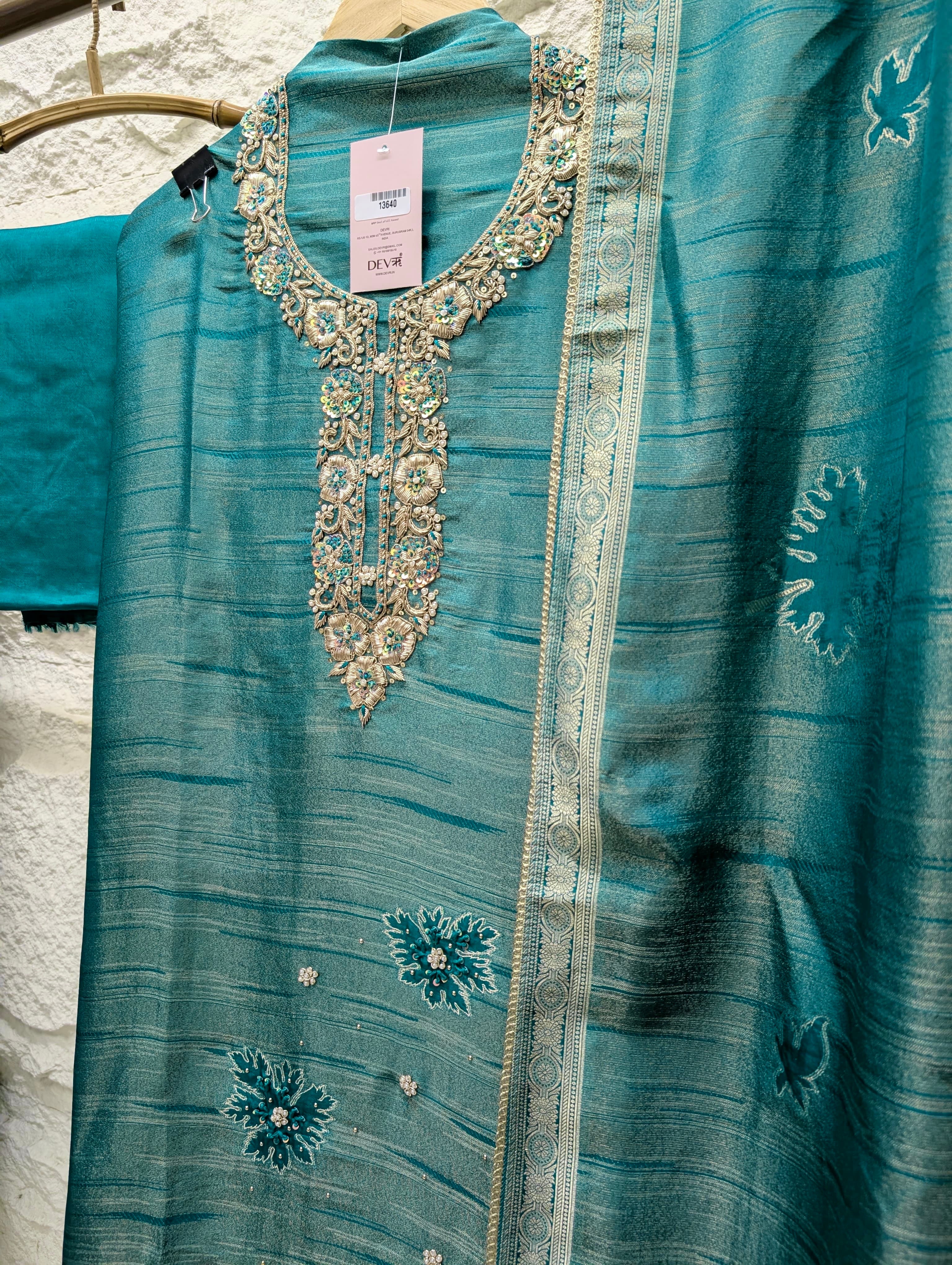 Teal Pure Girafe Banarasi Silk Embroidered Unstitched 3-Piece Suit (Devri – D.No 13640)