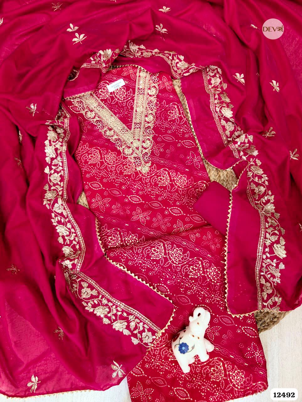 Rani Pink Modal Silk Embroidered Unstitched 3-Piece Suit (Devri – D.No. 12492)