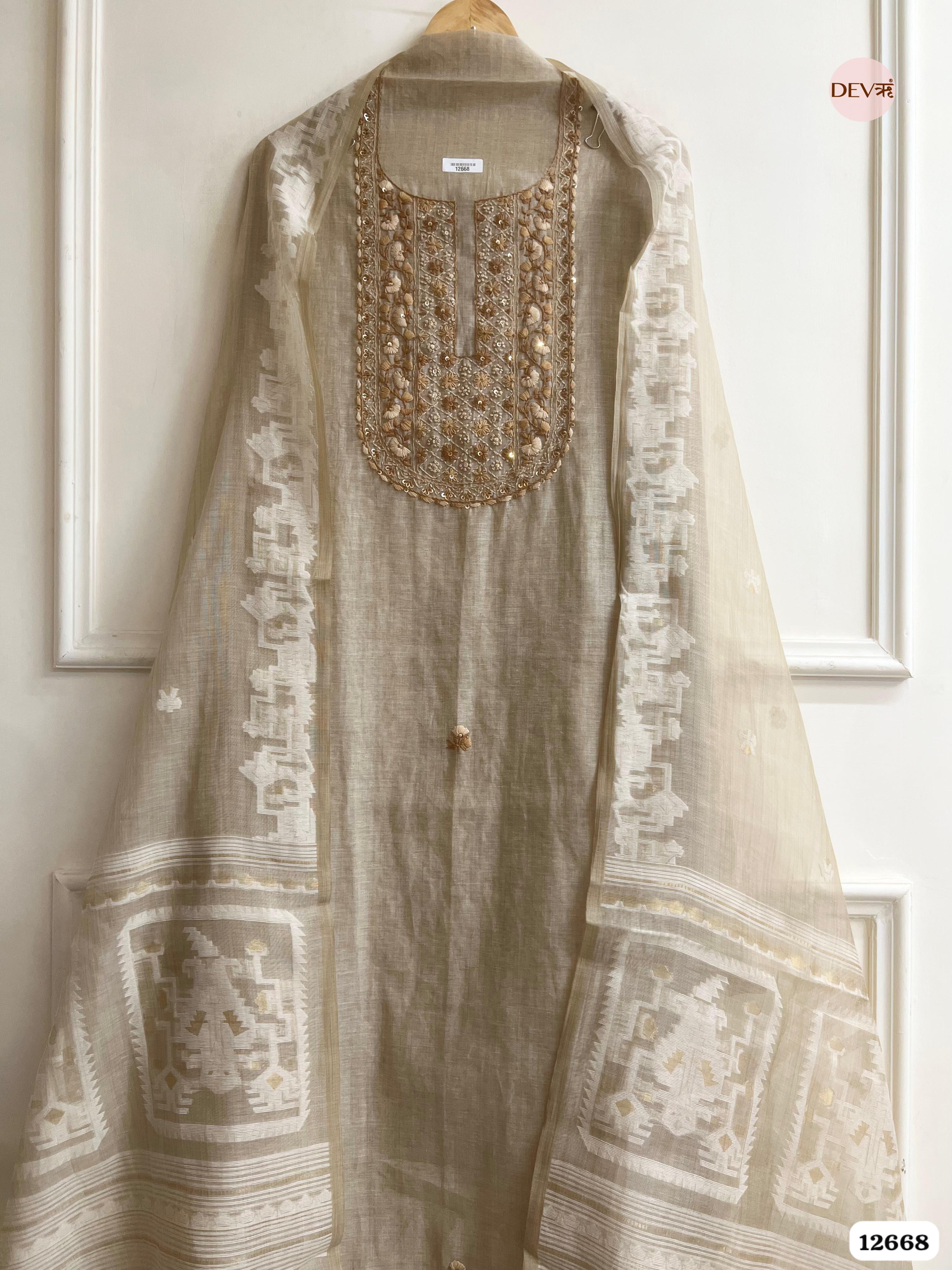 Beige Mul Chanderi Embroidered Unstitched 3-Piece Suit (Devri – D.No 12668)