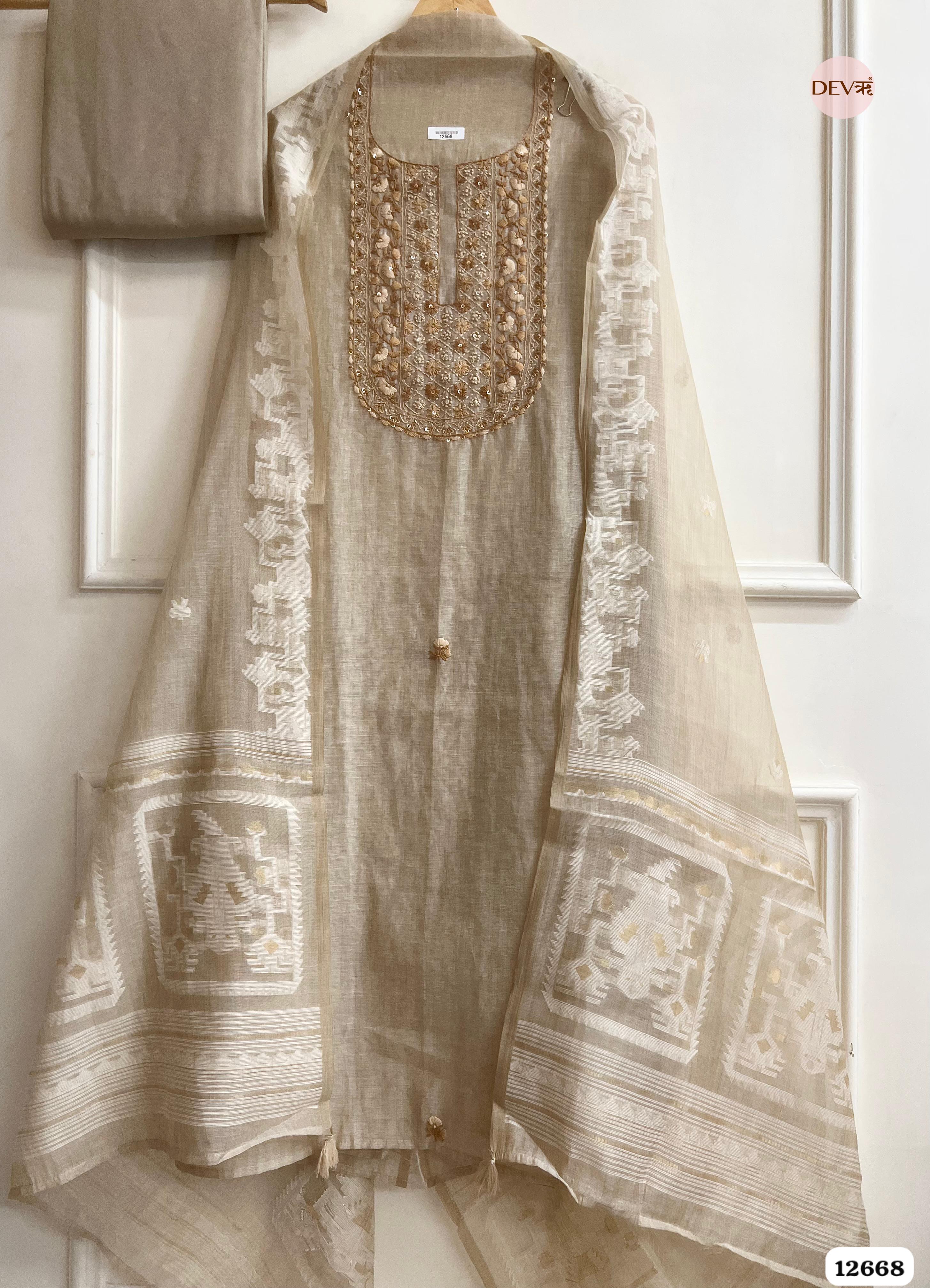 Beige Mul Chanderi Embroidered Unstitched 3-Piece Suit (Devri – D.No 12668)