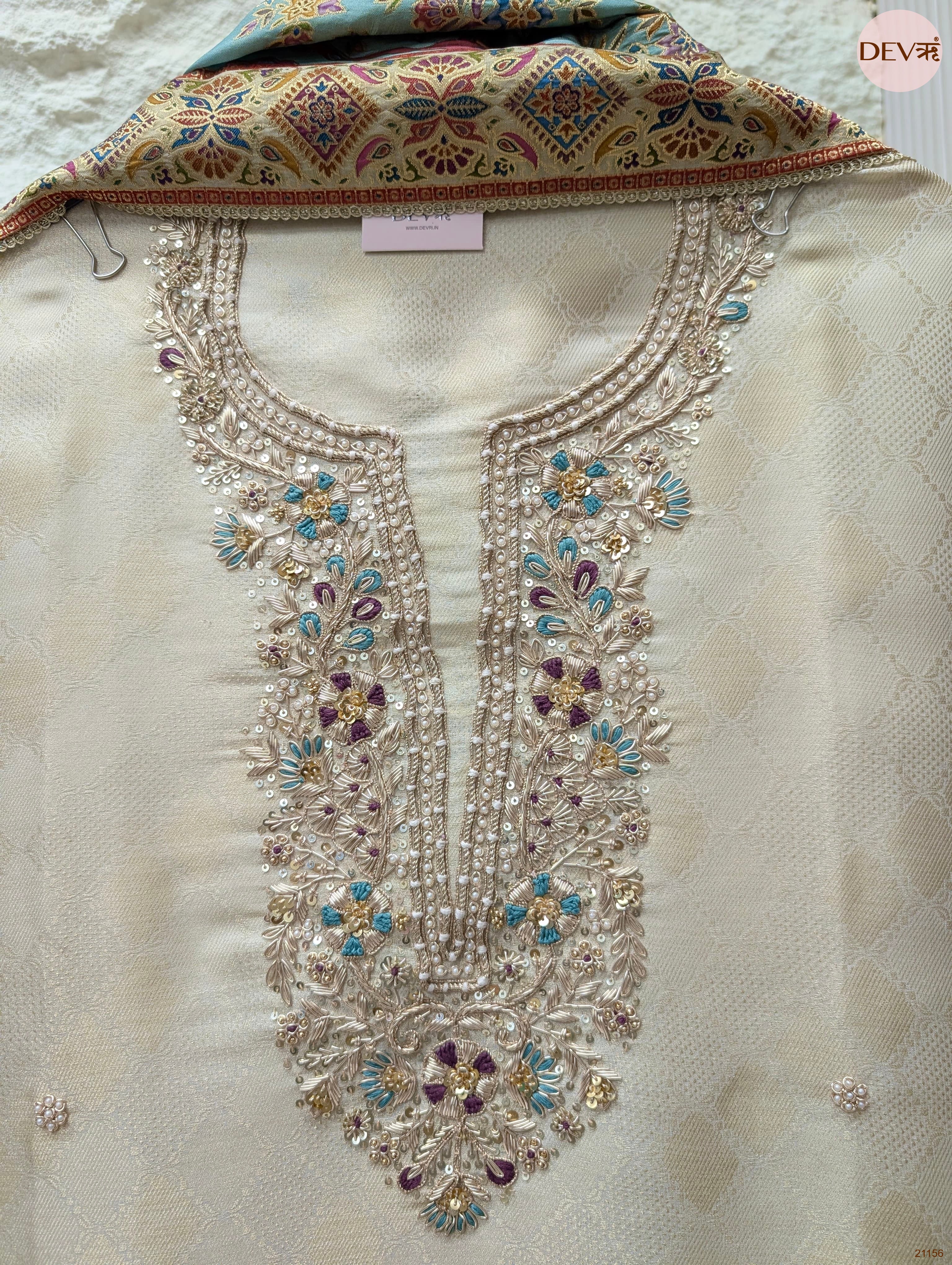 Off White Pure Banarasi Woven Silk Embroidered Unstitched 3-Piece Suit (Devri – D.No 21156)