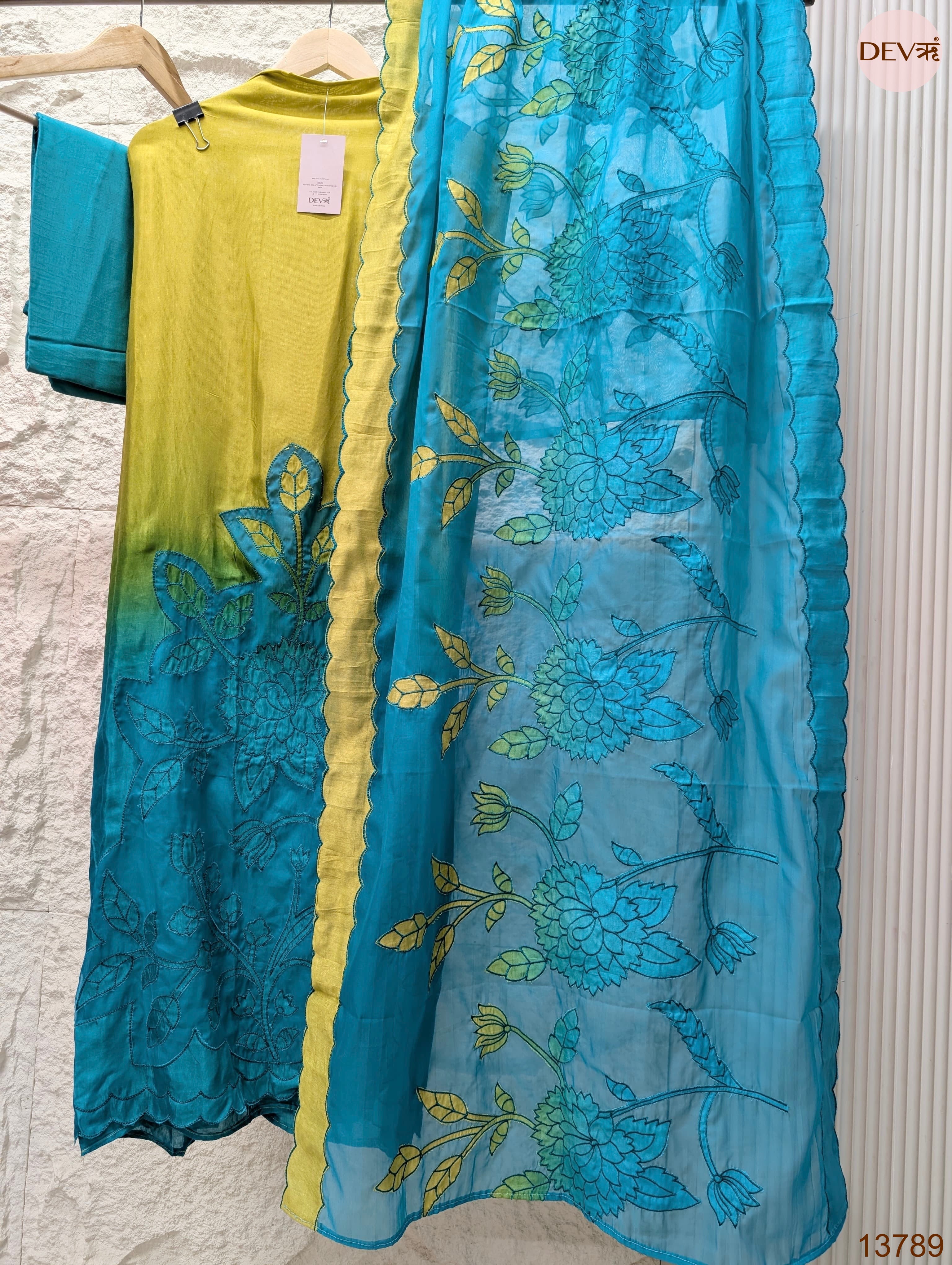 Teal Muslin Embroidered Unstitched 3-Piece Suit (Devri – D.No 13789)