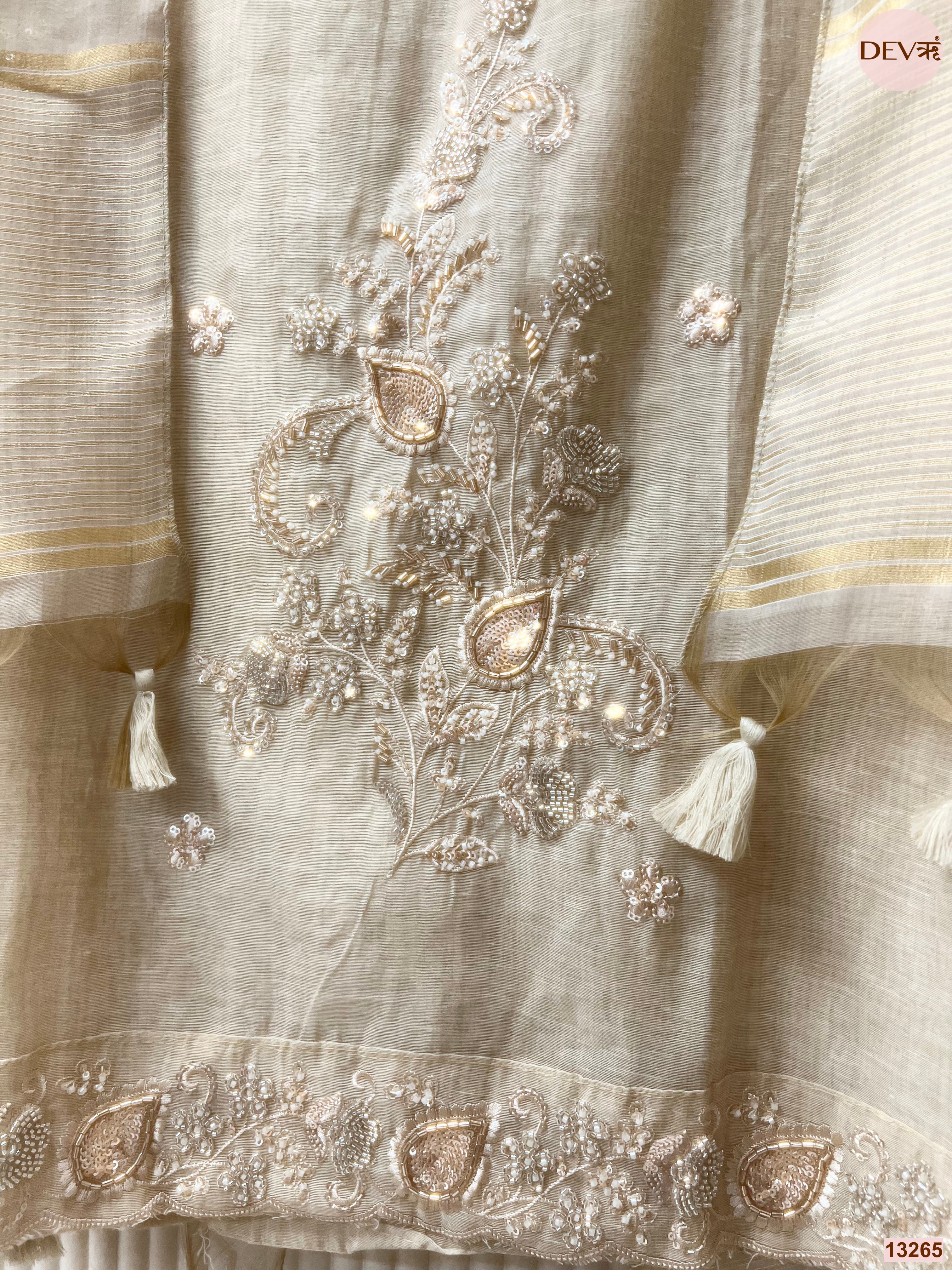 Cream Mul Chanderi Embroidered Unstitched 3-Piece Suit (Devri – D.No 13265)