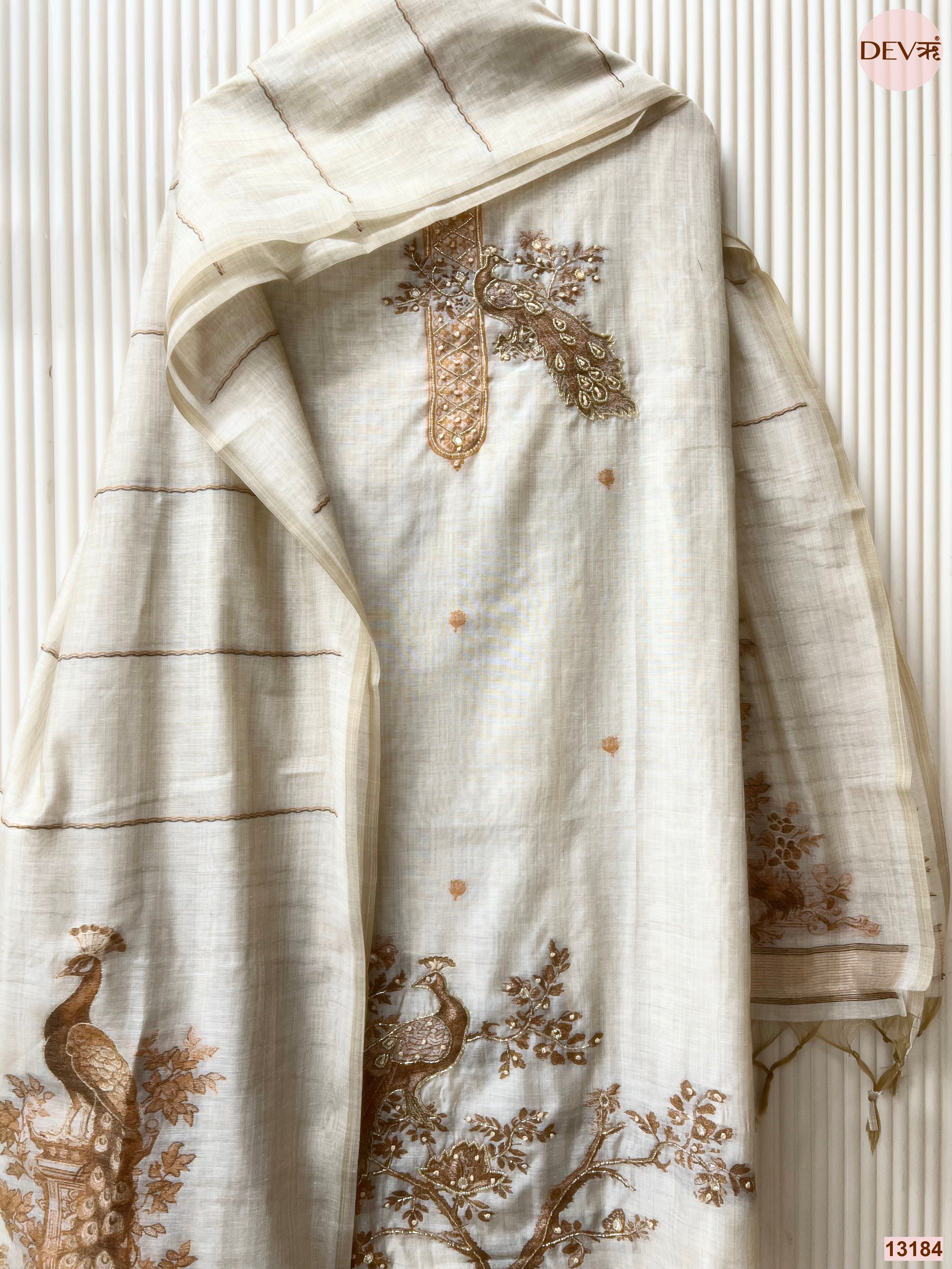 Off White Mul Chanderi Printed Unstitched 3-Piece Suit (Devri – D.No 13184)