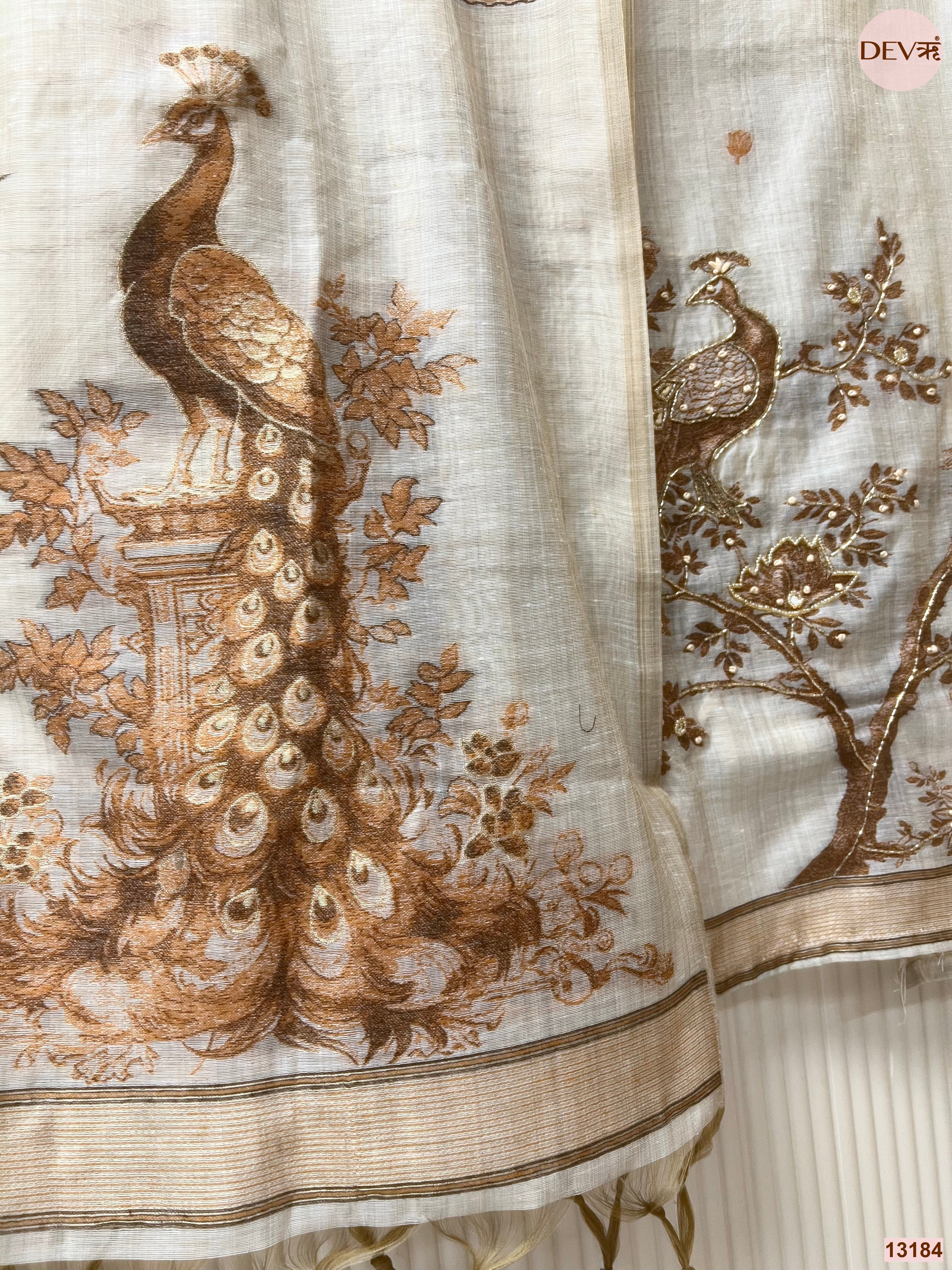 Off White Mul Chanderi Printed Unstitched 3-Piece Suit (Devri – D.No 13184)