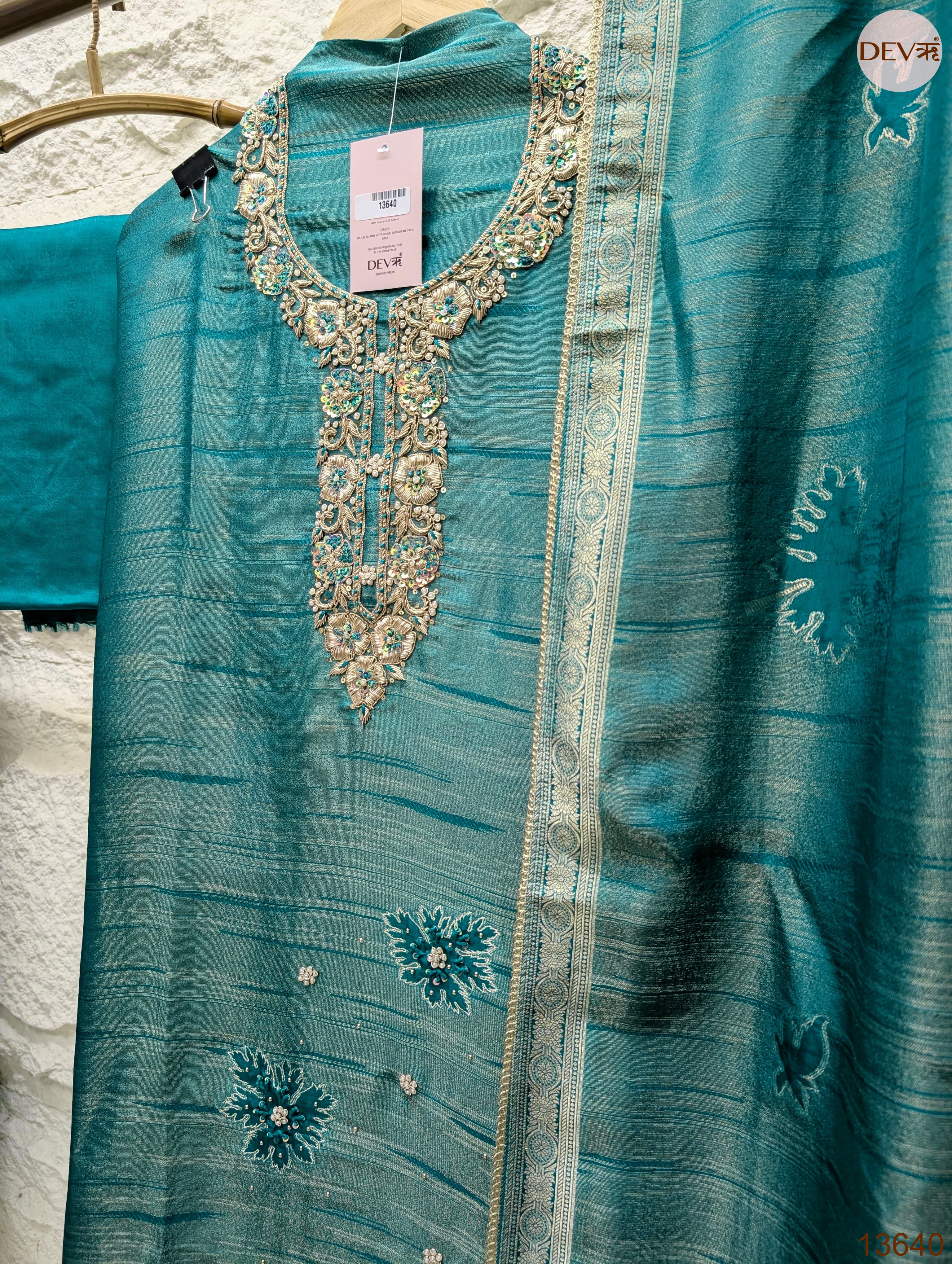 Teal Pure Girafe Banarasi Silk Embroidered Unstitched 3-Piece Suit (Devri – D.No 13640)