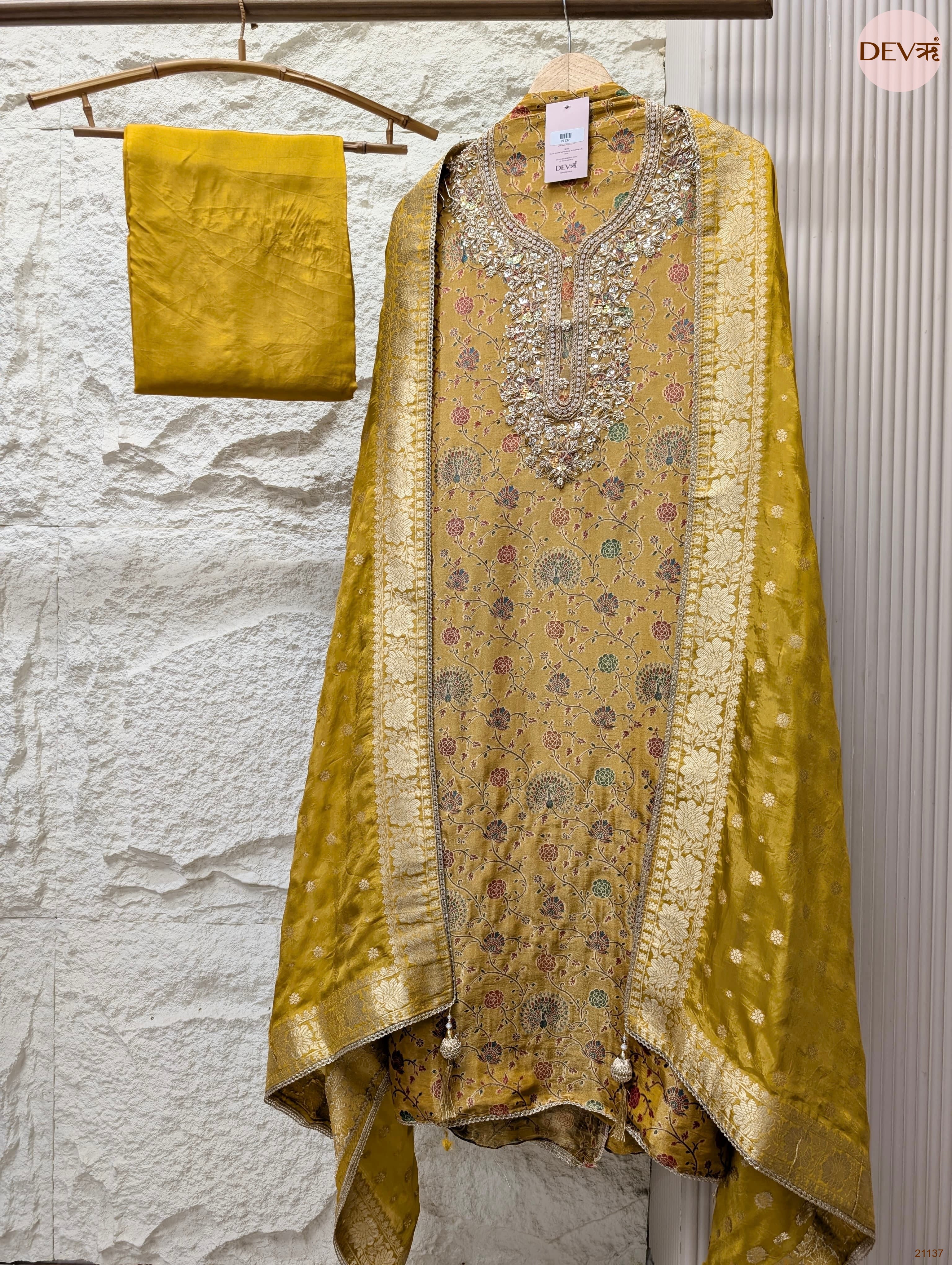 Mustard Pure Banarasi Woven Silk Printed Unstitched 3-Piece Suit (Devri – D.No 21137)