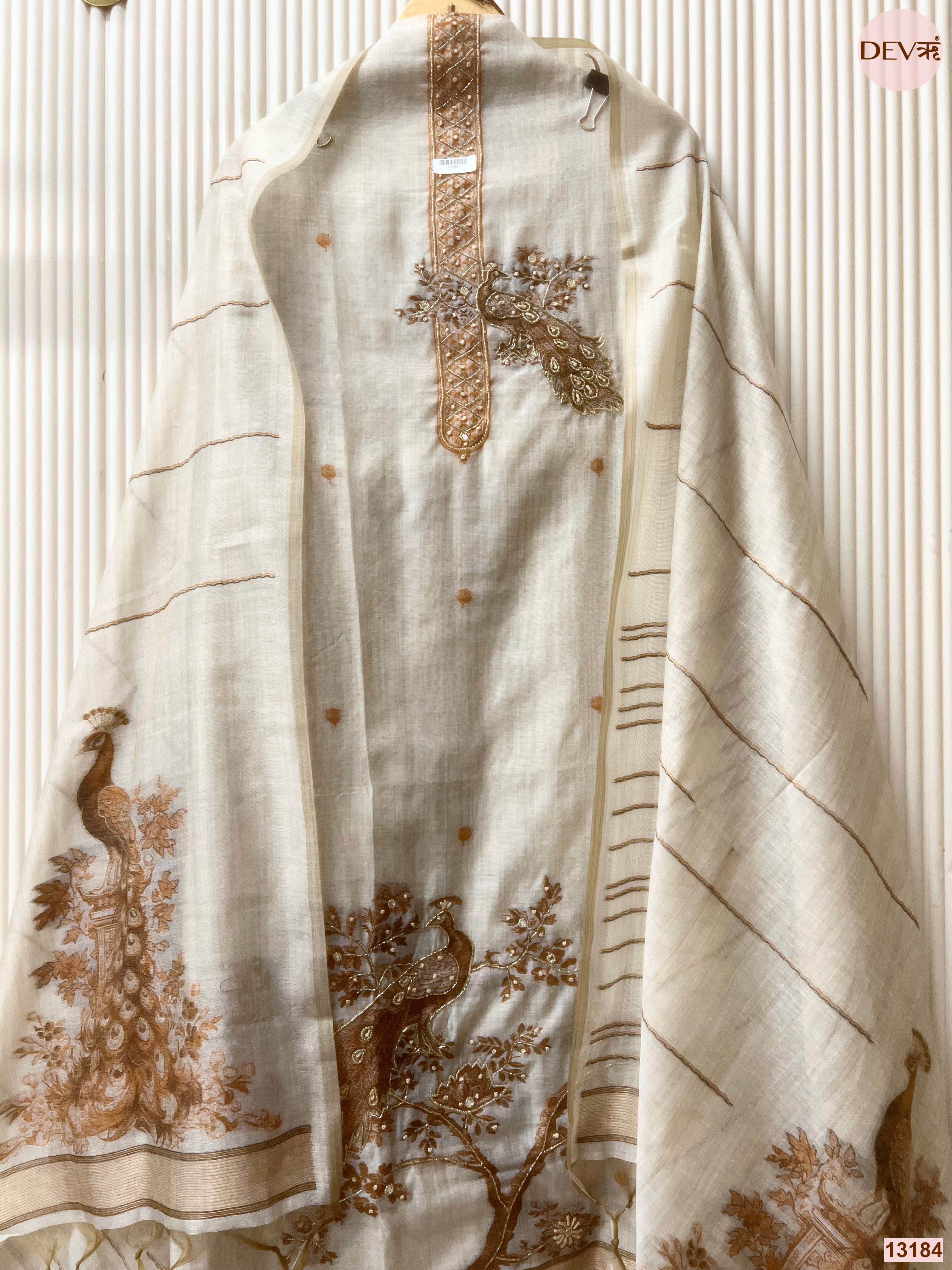 Off White Mul Chanderi Printed Unstitched 3-Piece Suit (Devri – D.No 13184)