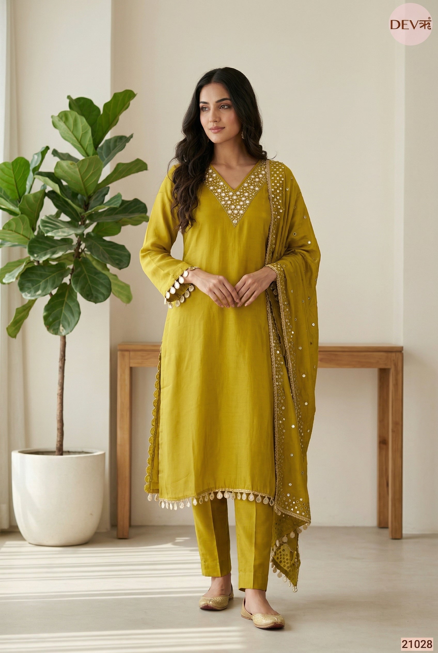 21028