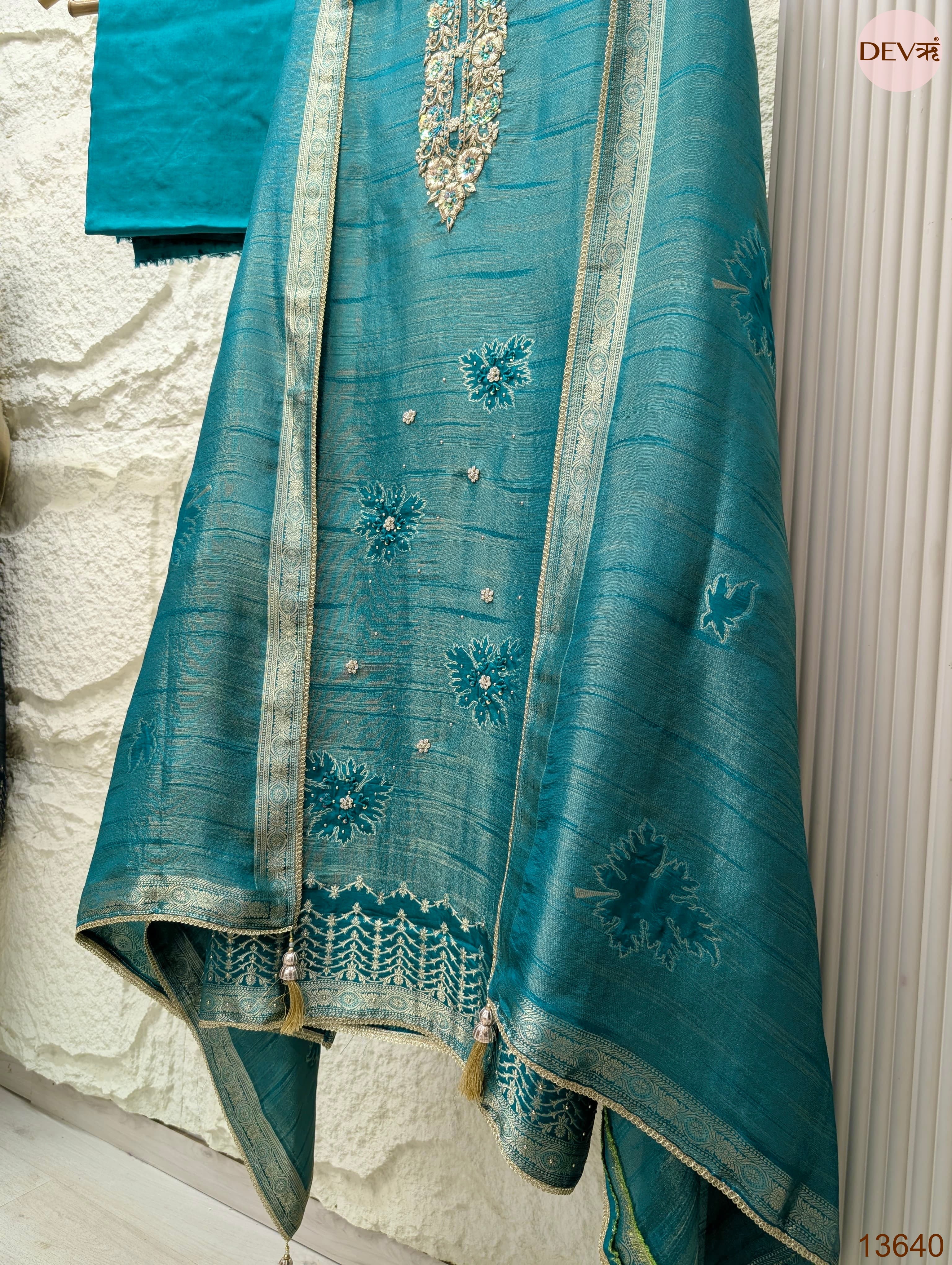 Teal Pure Girafe Banarasi Silk Embroidered Unstitched 3-Piece Suit (Devri – D.No 13640)