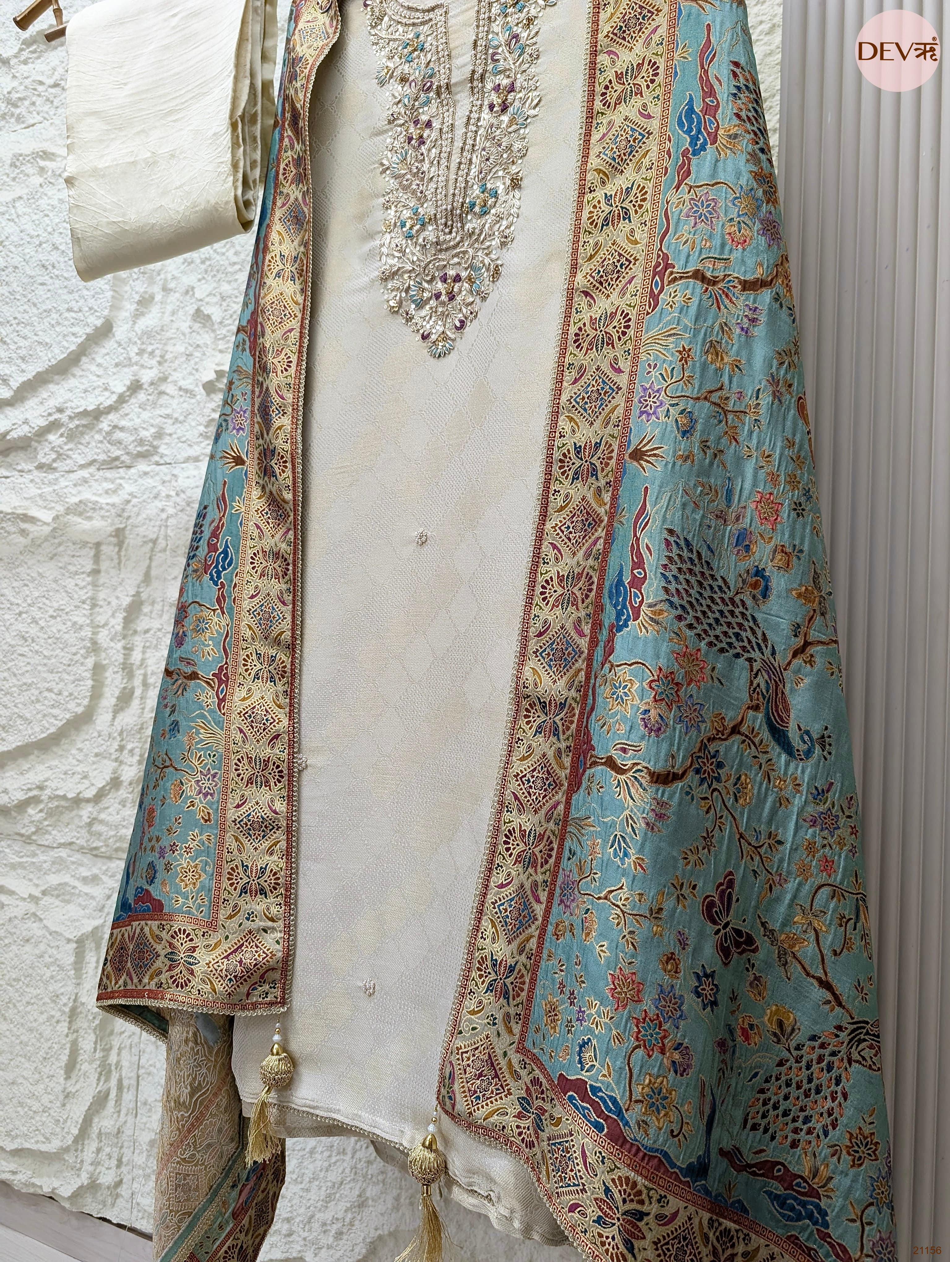 Off White Pure Banarasi Woven Silk Embroidered Unstitched 3-Piece Suit (Devri – D.No 21156)