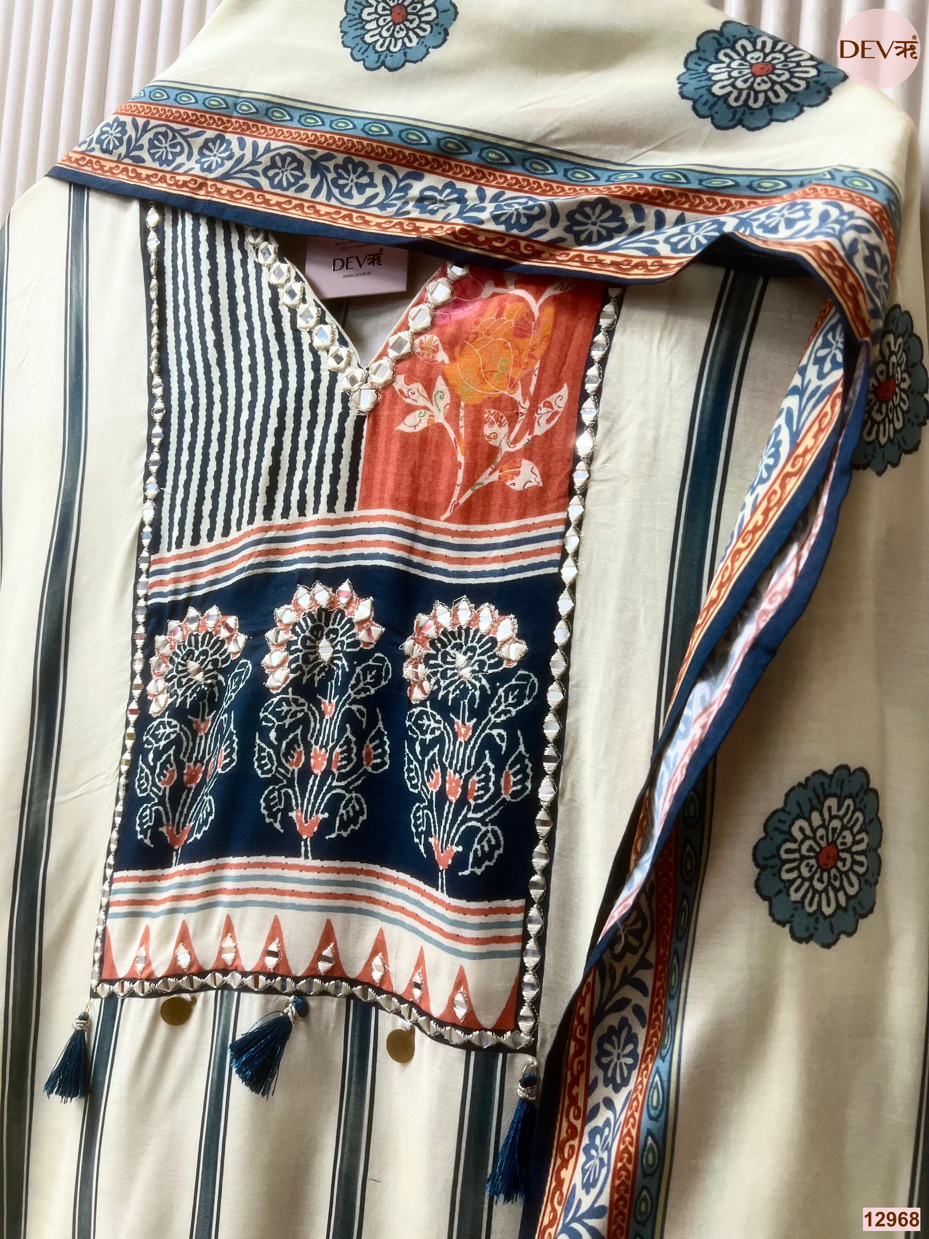 Cream Muslin Printed Unstitched 3-Piece Suit (Devri – D.No 12968)