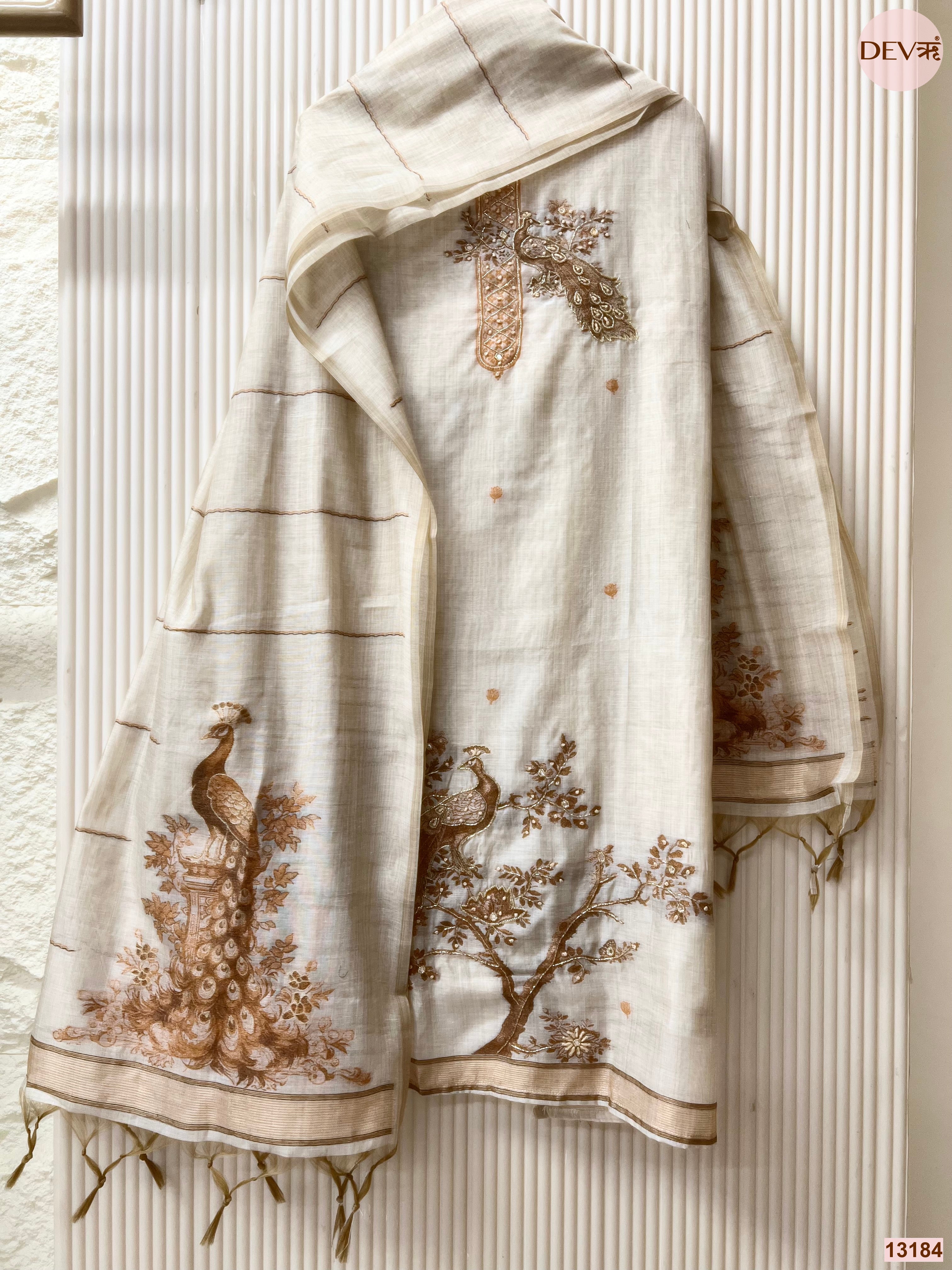Off White Mul Chanderi Printed Unstitched 3-Piece Suit (Devri – D.No 13184)