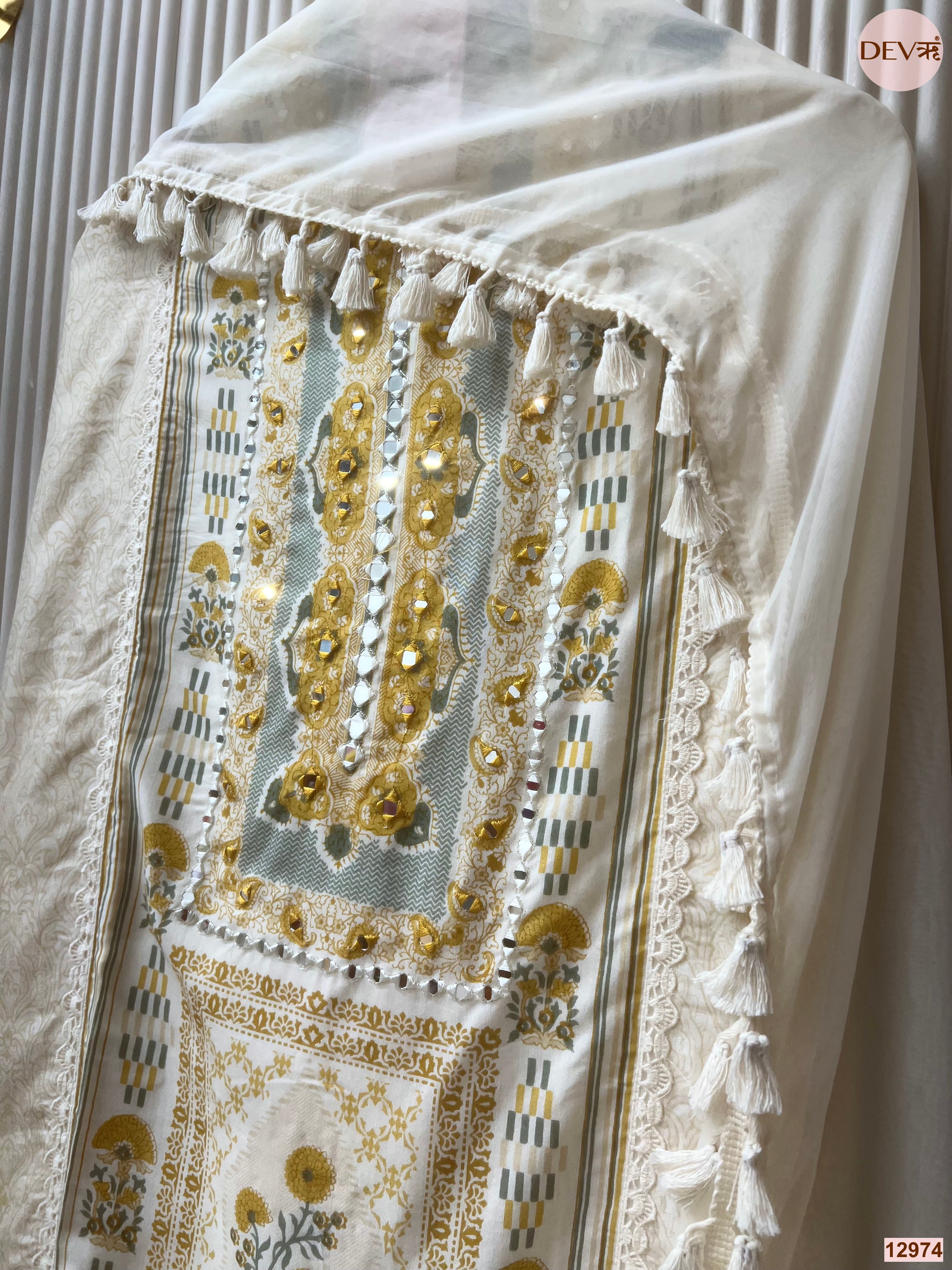 Off White Muslin Printed Unstitched 3-Piece Suit (Devri – D.No 12974)