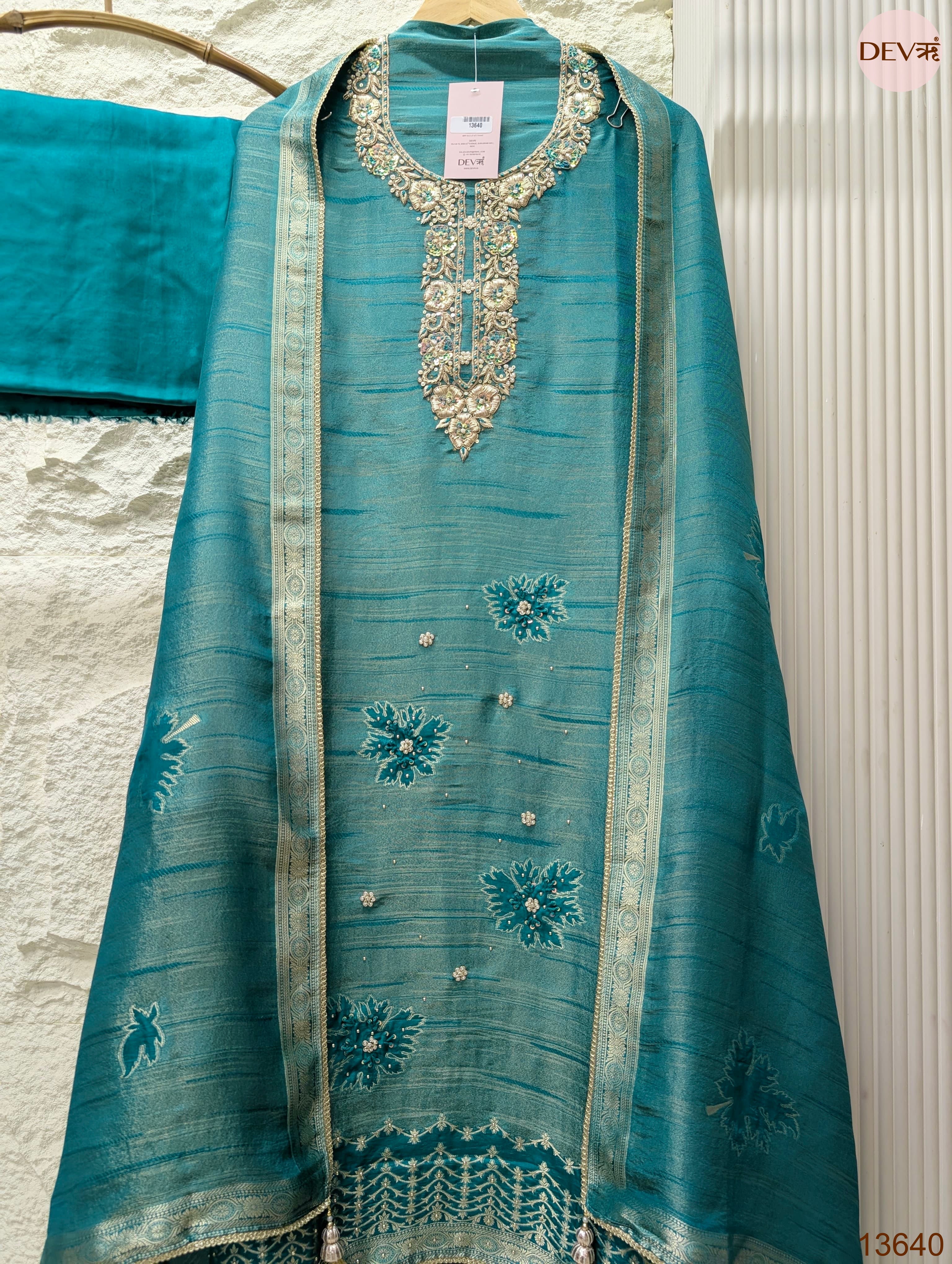 Teal Pure Girafe Banarasi Silk Embroidered Unstitched 3-Piece Suit (Devri – D.No 13640)