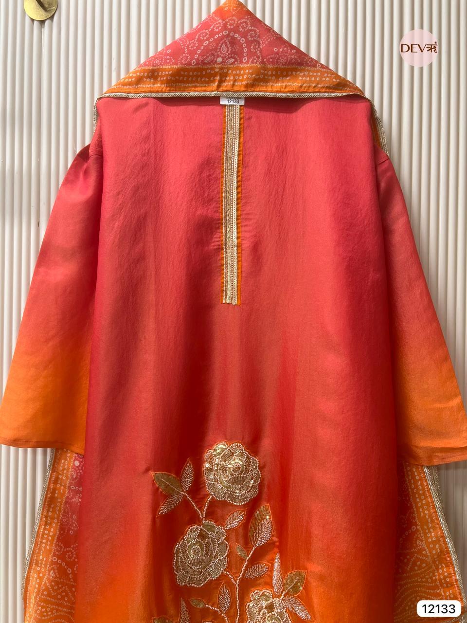 Red–Orange Soft Tissue Silk Embroidered Unstitched 3-Piece Suit (Devri – D.No 12133)