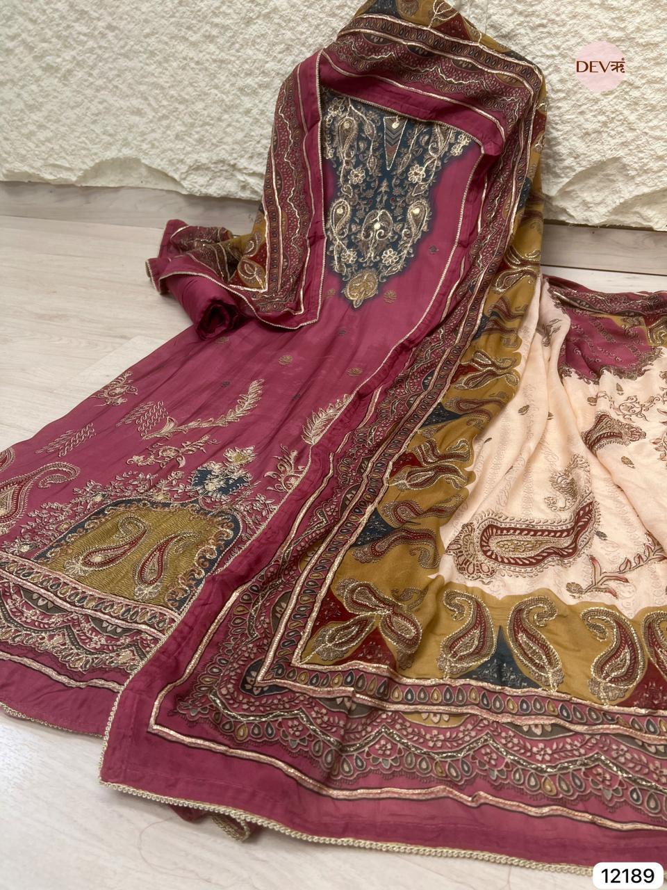Wine Muslin Embroidered Unstitched 3-Piece Suit (Devri – D.No 12189)