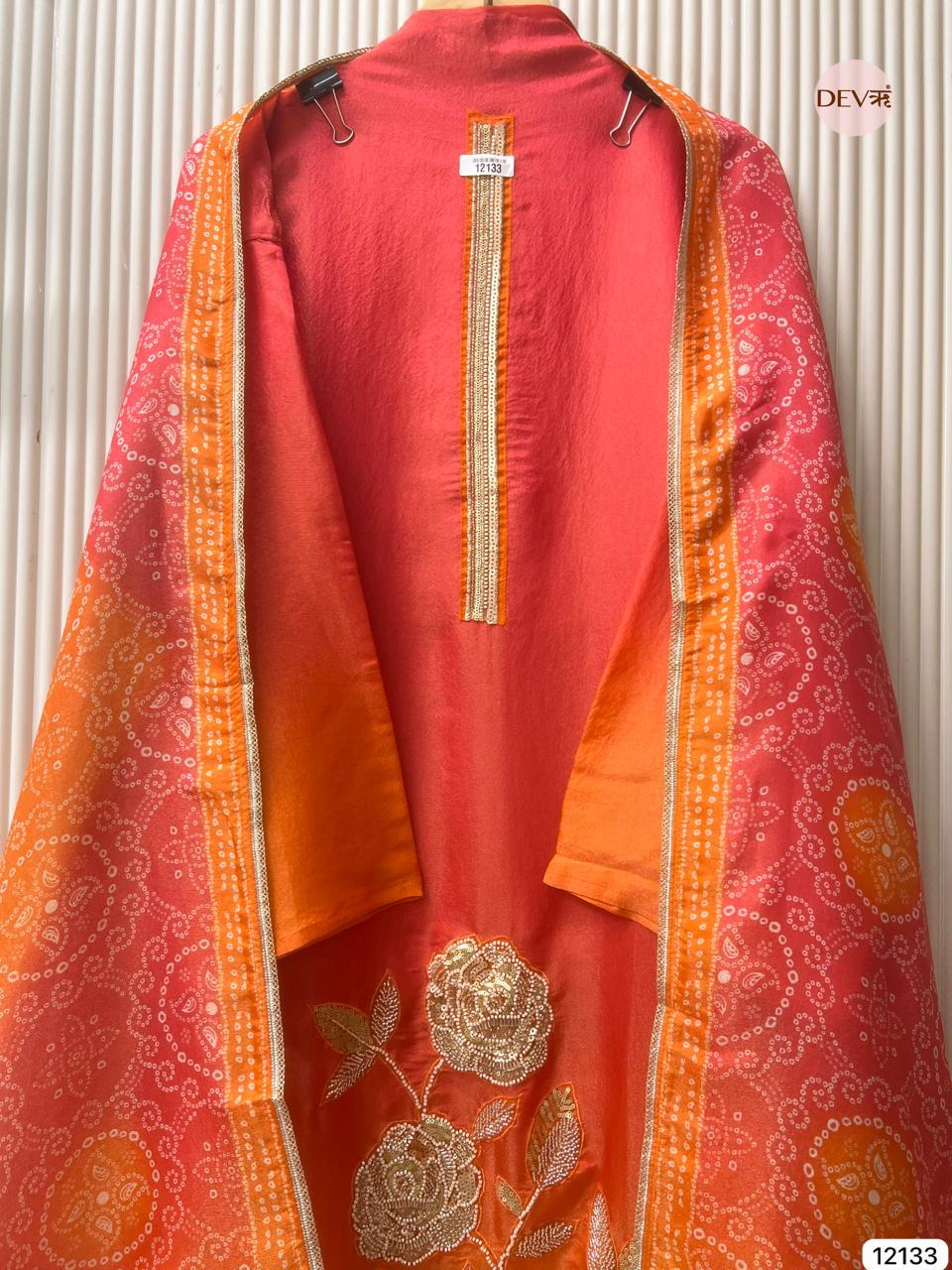 Red–Orange Soft Tissue Silk Embroidered Unstitched 3-Piece Suit (Devri – D.No 12133)