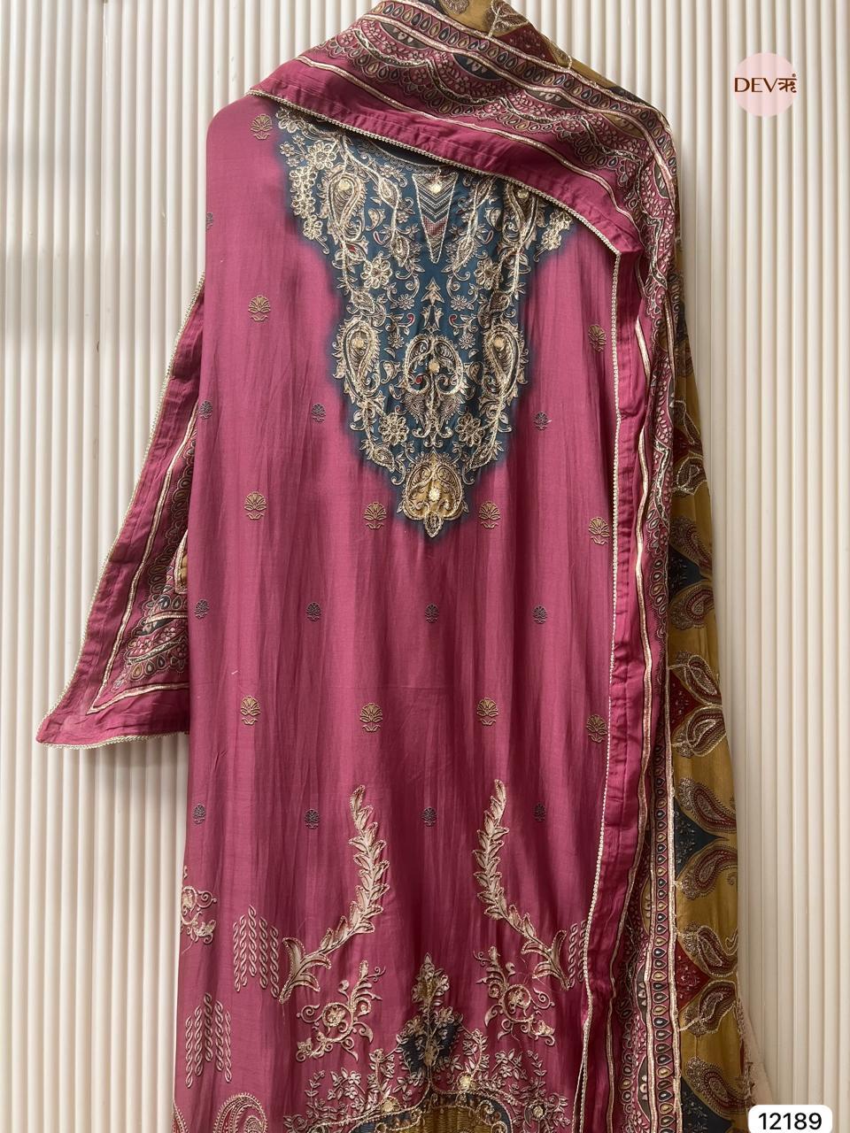 Wine Muslin Embroidered Unstitched 3-Piece Suit (Devri – D.No 12189)
