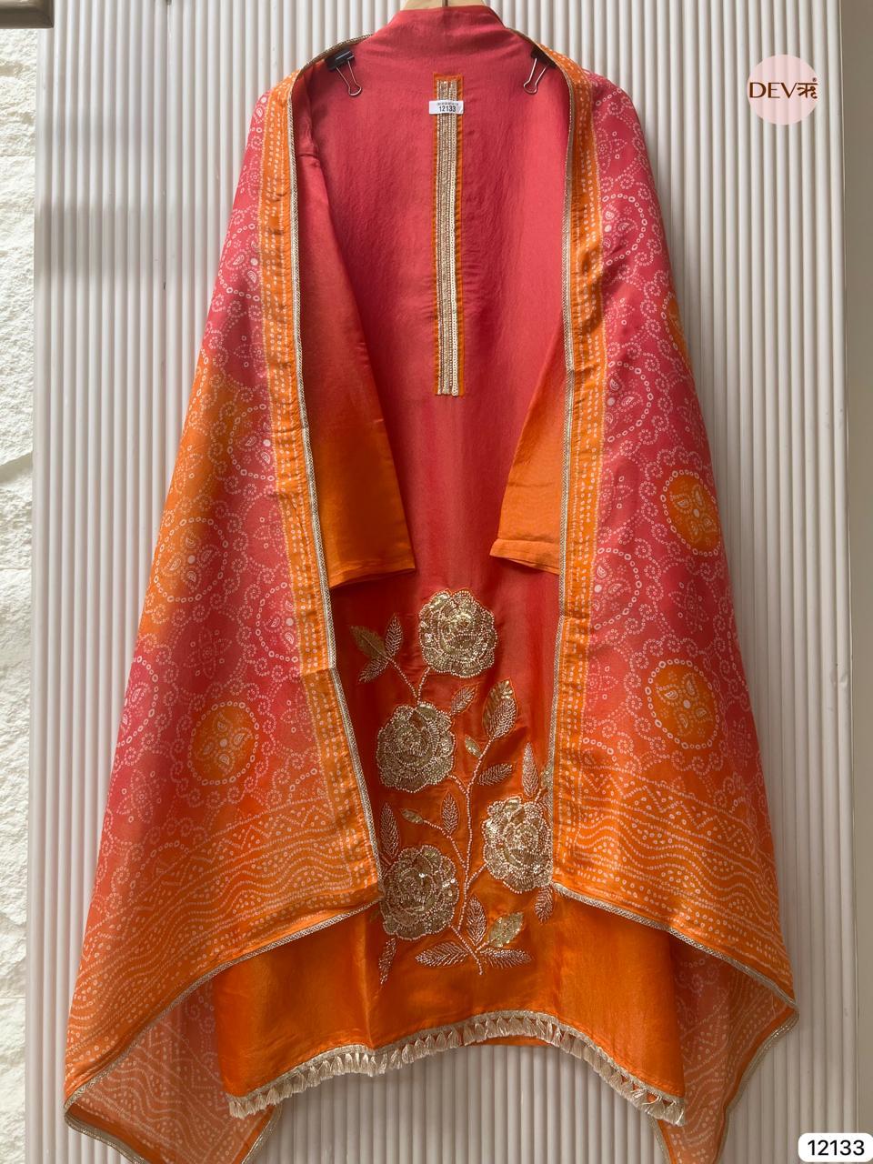 Red–Orange Soft Tissue Silk Embroidered Unstitched 3-Piece Suit (Devri – D.No 12133)