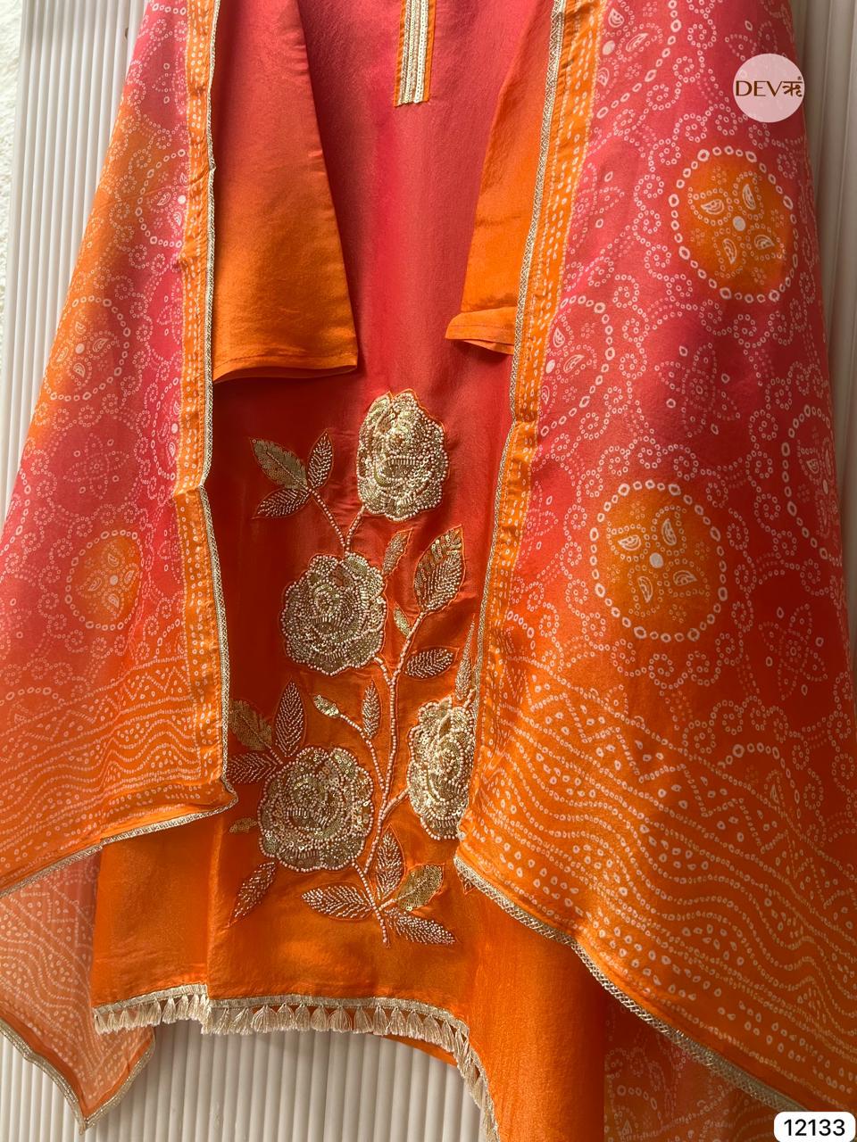 Red–Orange Soft Tissue Silk Embroidered Unstitched 3-Piece Suit (Devri – D.No 12133)