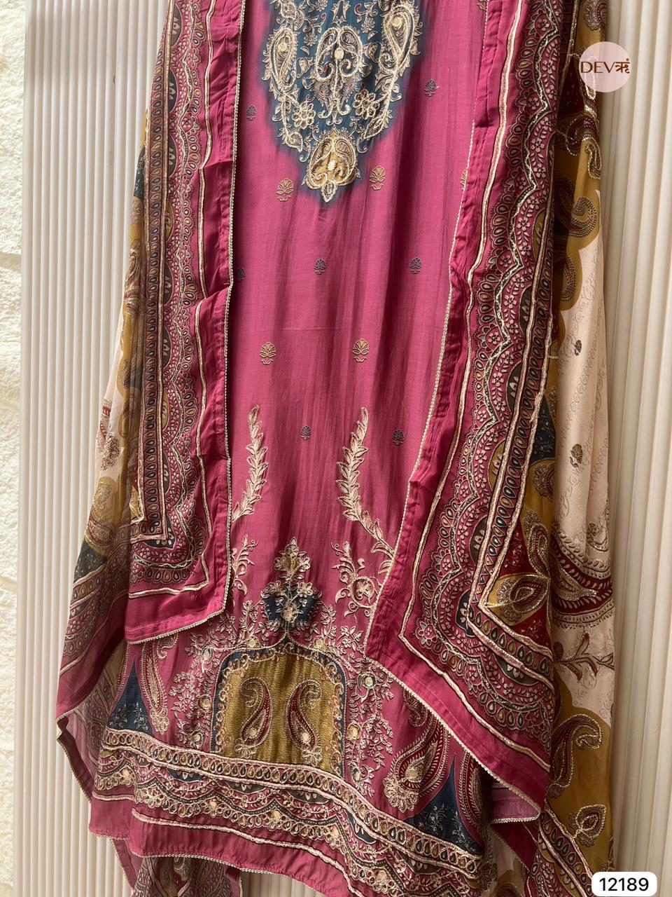 Wine Muslin Embroidered Unstitched 3-Piece Suit (Devri – D.No 12189)