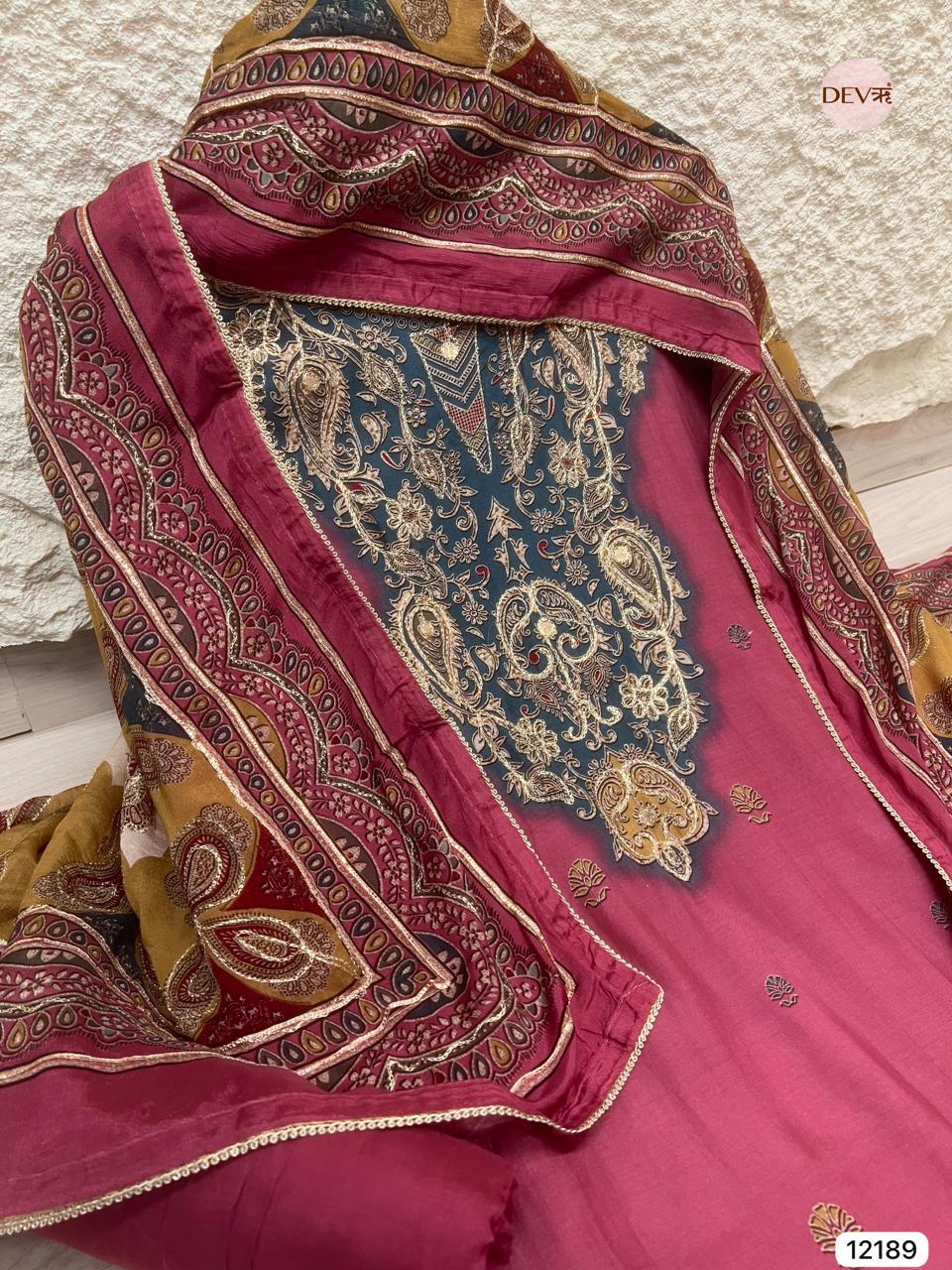 Wine Muslin Embroidered Unstitched 3-Piece Suit (Devri – D.No 12189)