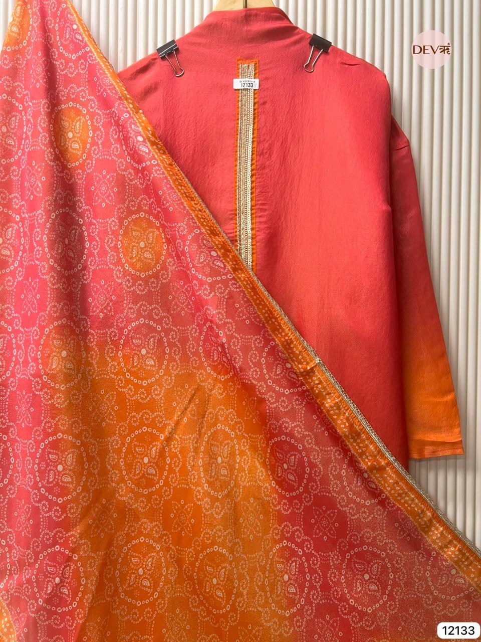 Red–Orange Soft Tissue Silk Embroidered Unstitched 3-Piece Suit (Devri – D.No 12133)