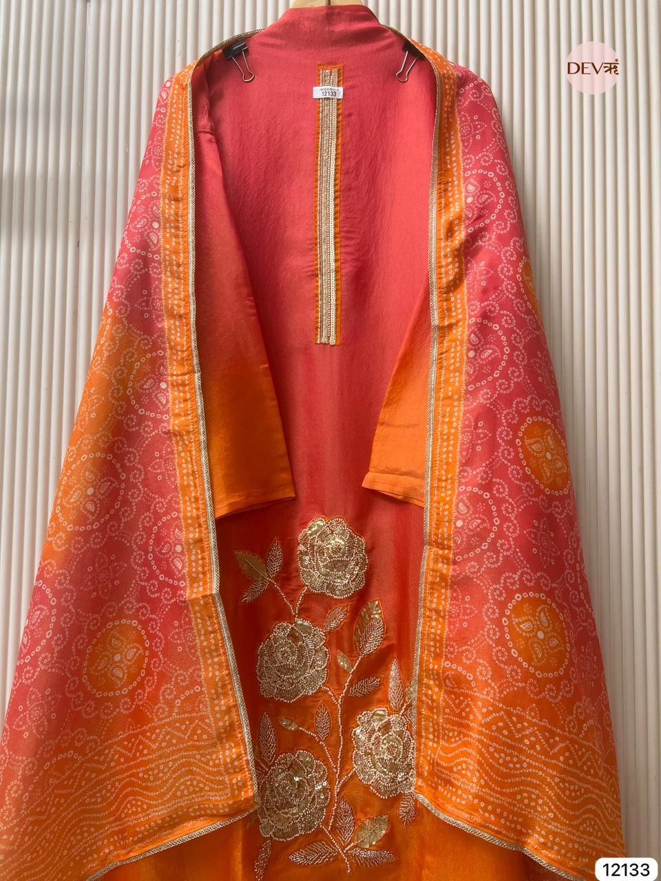 Red–Orange Soft Tissue Silk Embroidered Unstitched 3-Piece Suit (Devri – D.No 12133)