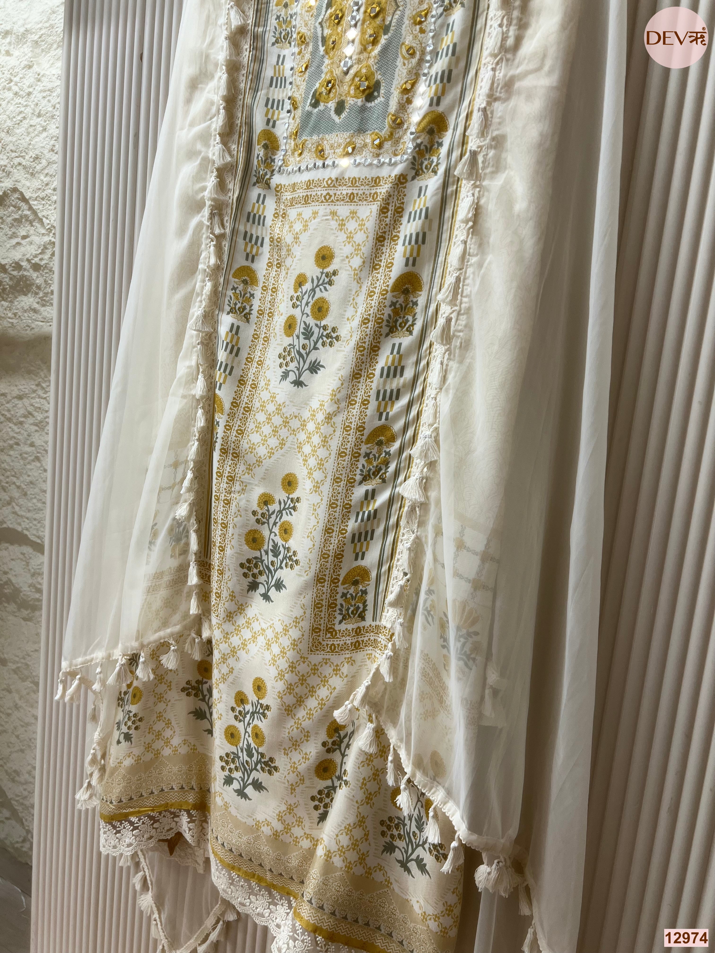 Off White Muslin Printed Unstitched 3-Piece Suit (Devri – D.No 12974)