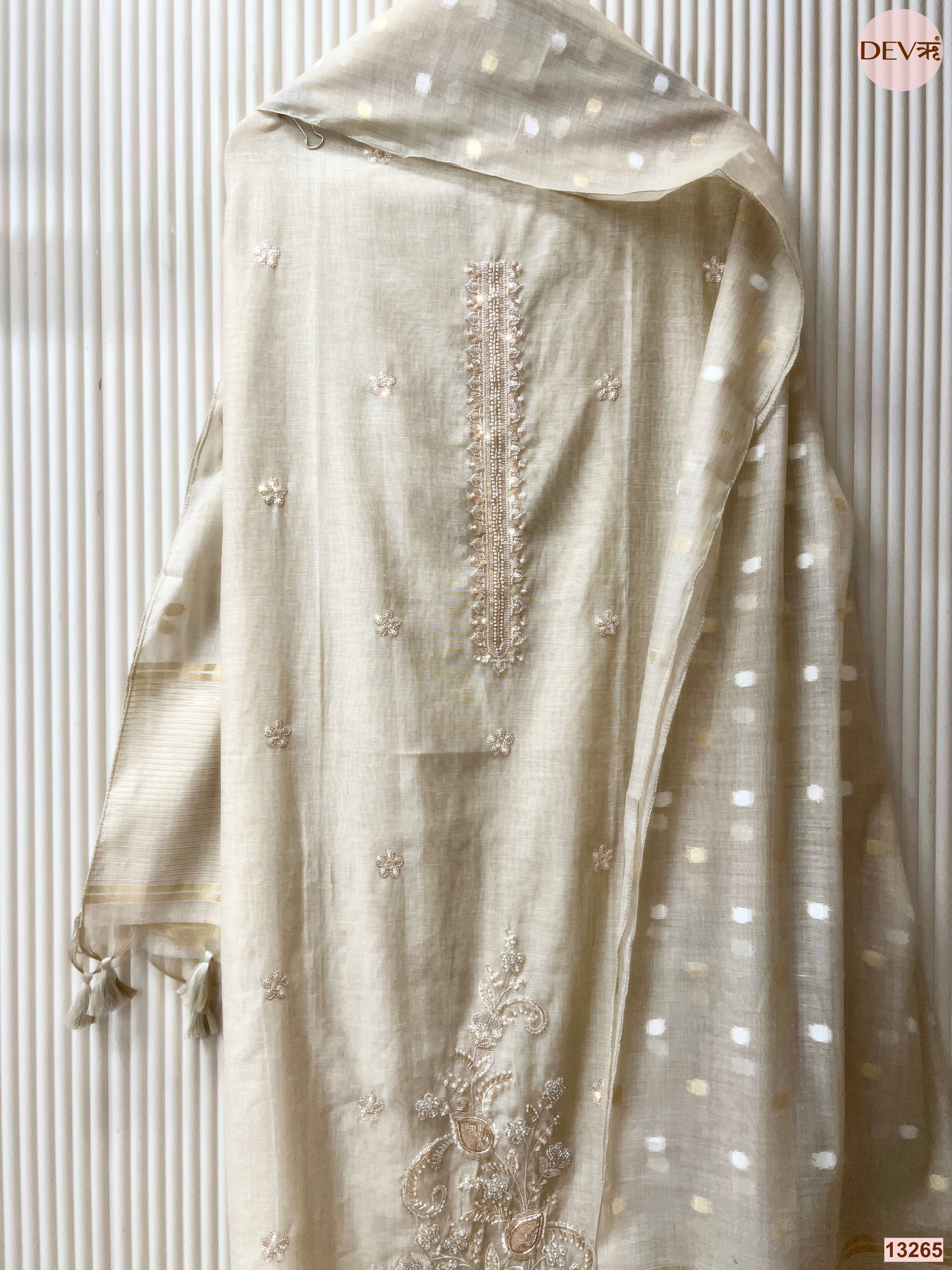 Cream Mul Chanderi Embroidered Unstitched 3-Piece Suit (Devri – D.No 13265)