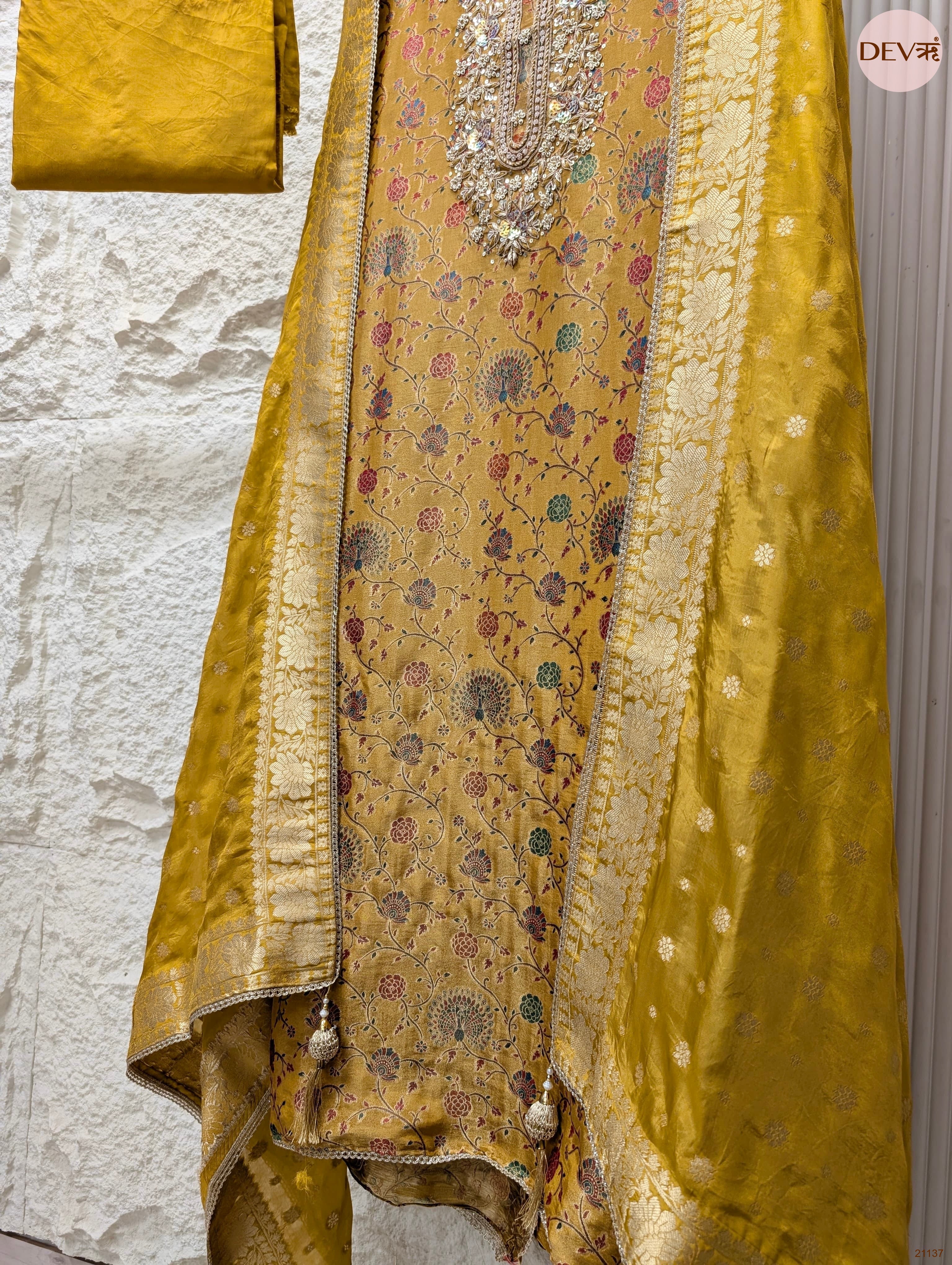 Mustard Pure Banarasi Woven Silk Printed Unstitched 3-Piece Suit (Devri – D.No 21137)